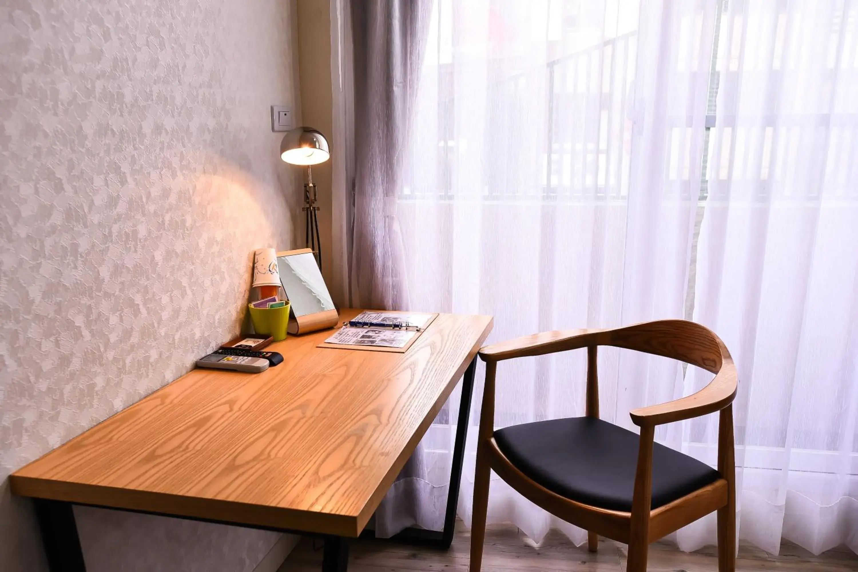 Bedroom, Seating Area in Rainbow Island B&b