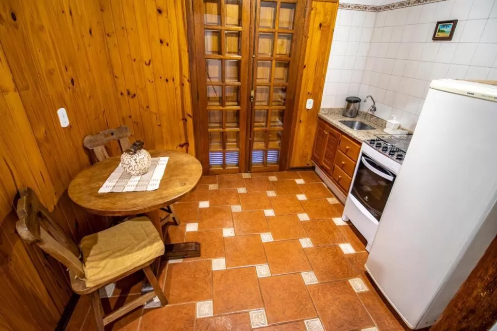 Kitchen or kitchenette in Pousada Ricanto Amore Mio