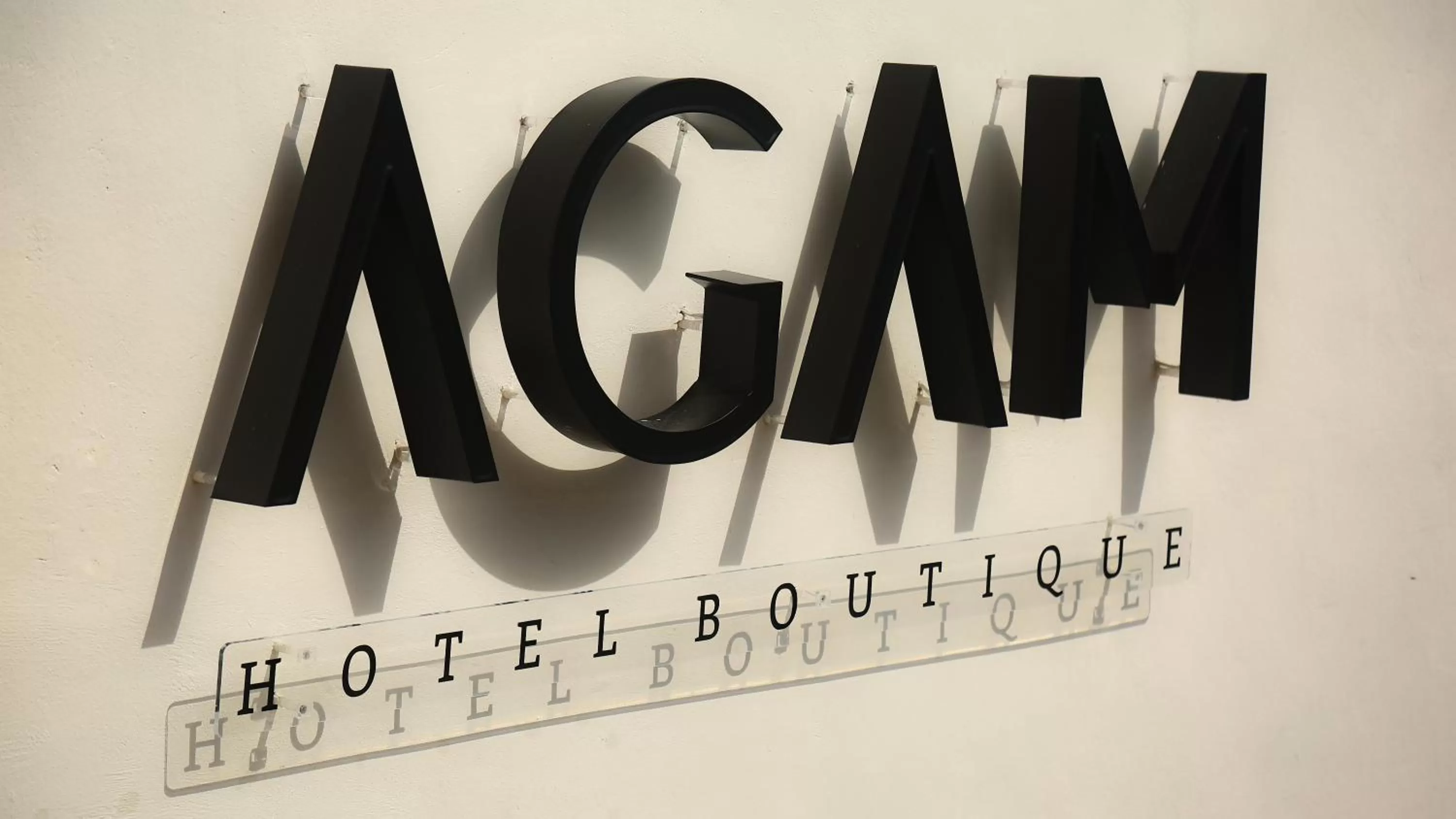 Property logo or sign in AGAM Hotel Boutique Bacalar - Adults Only