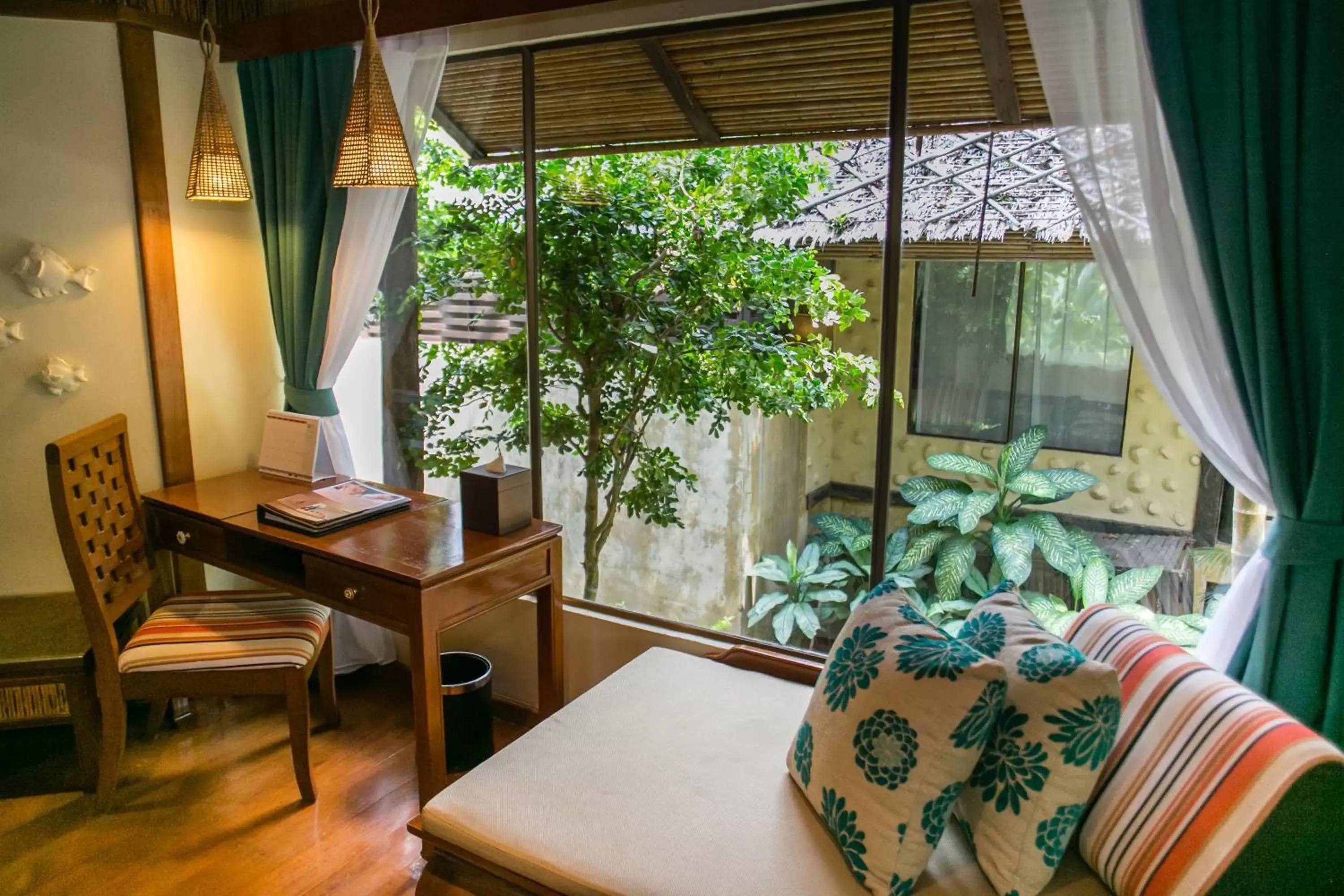 Photo of the whole room, Seating Area in Centara Koh Chang Tropicana Resort