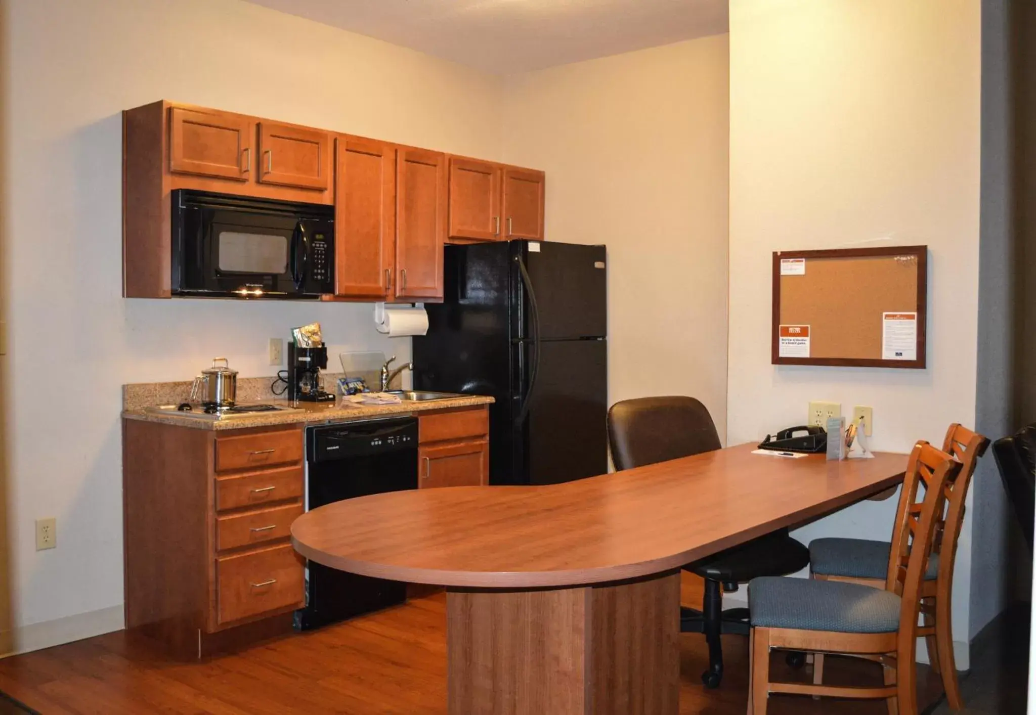 Photo of the whole room, Kitchen/Kitchenette in Candlewood Suites-Augusta, an IHG Hotel