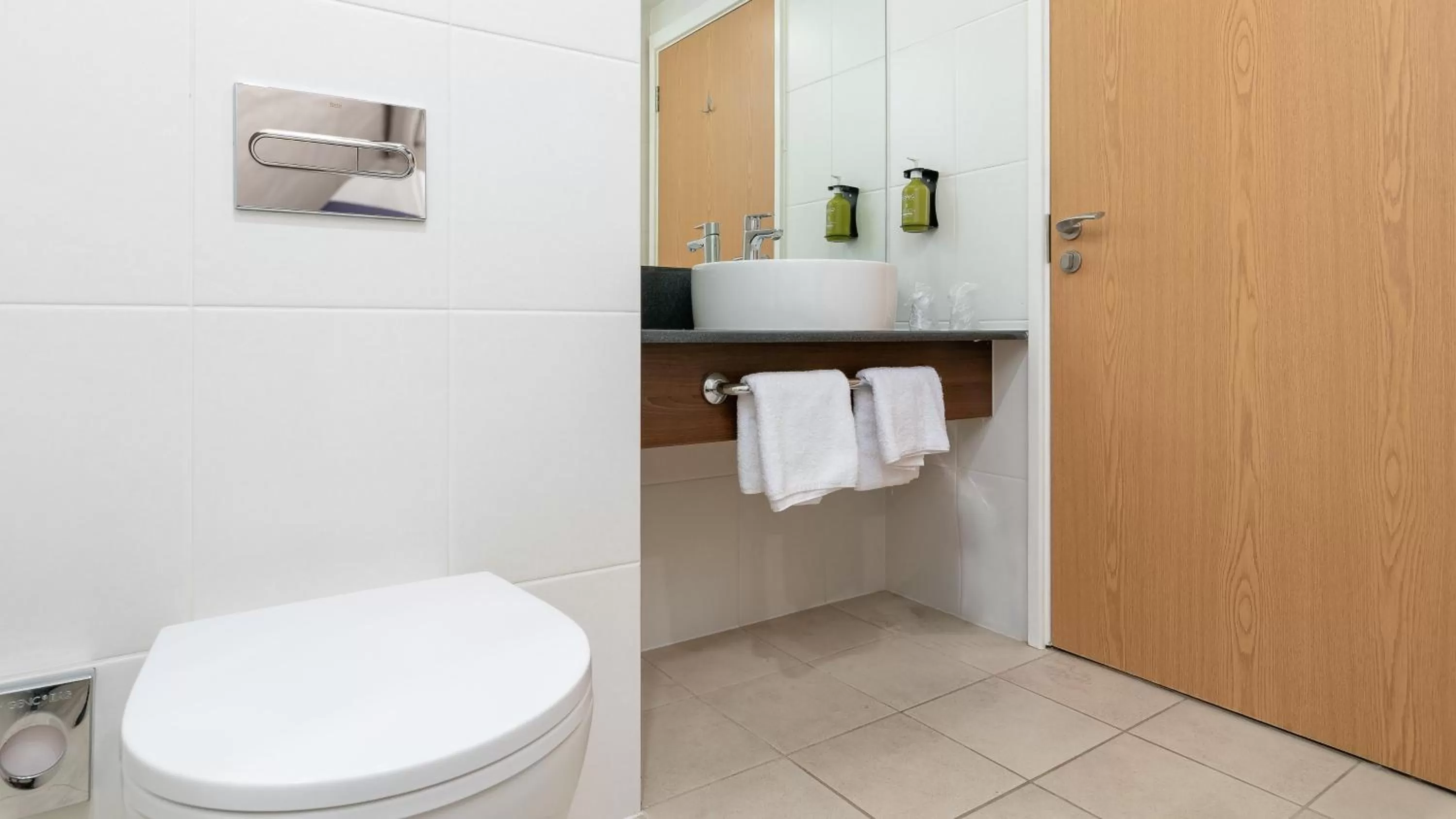 Bathroom in Holiday Inn Express Leigh - Sports Village by IHG