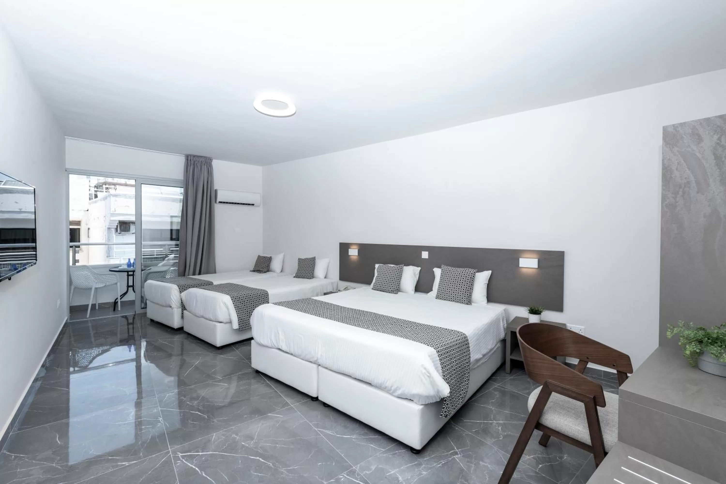 Bed in Blazer Residence