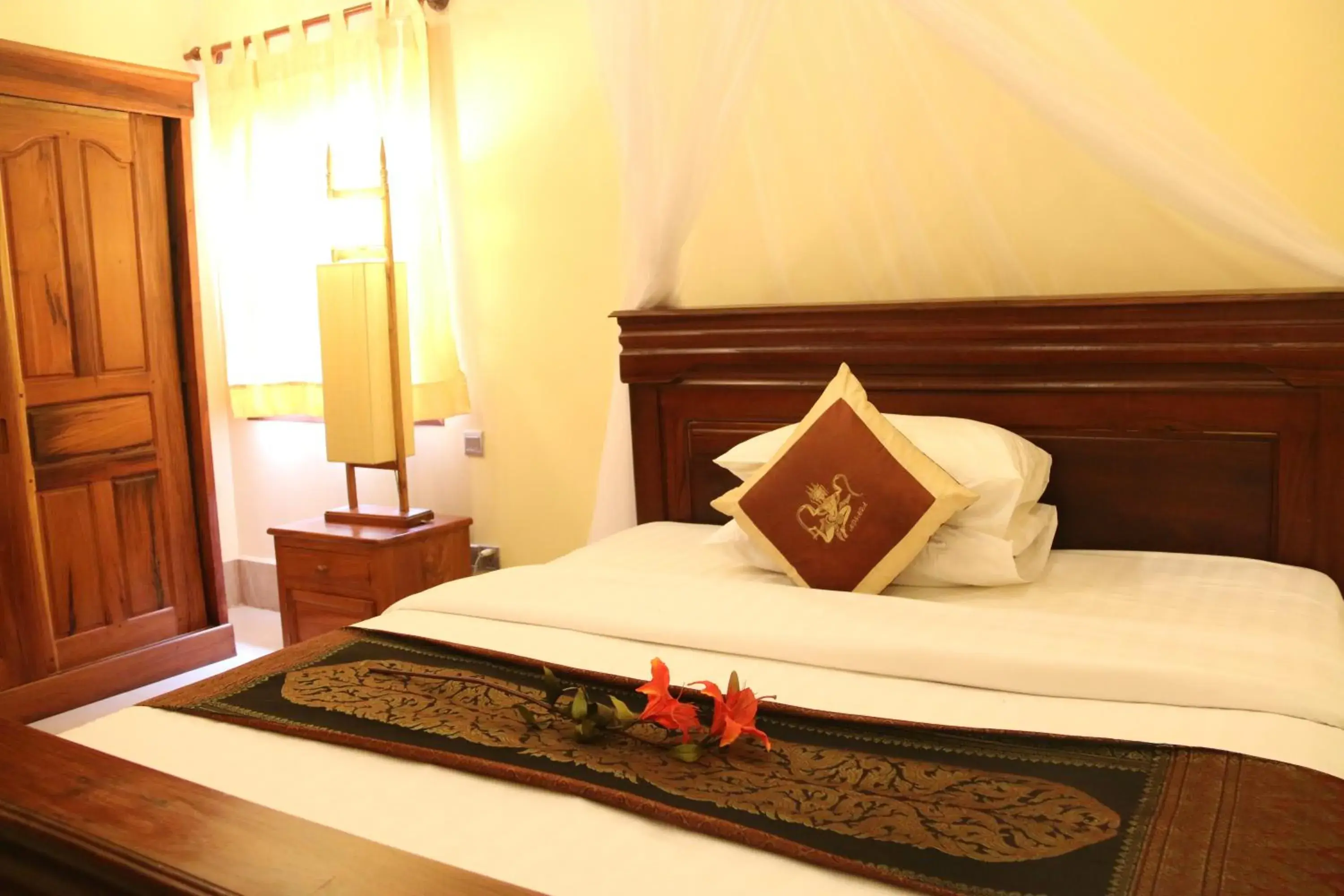 Bed in Shining Angkor Boutique Hotel