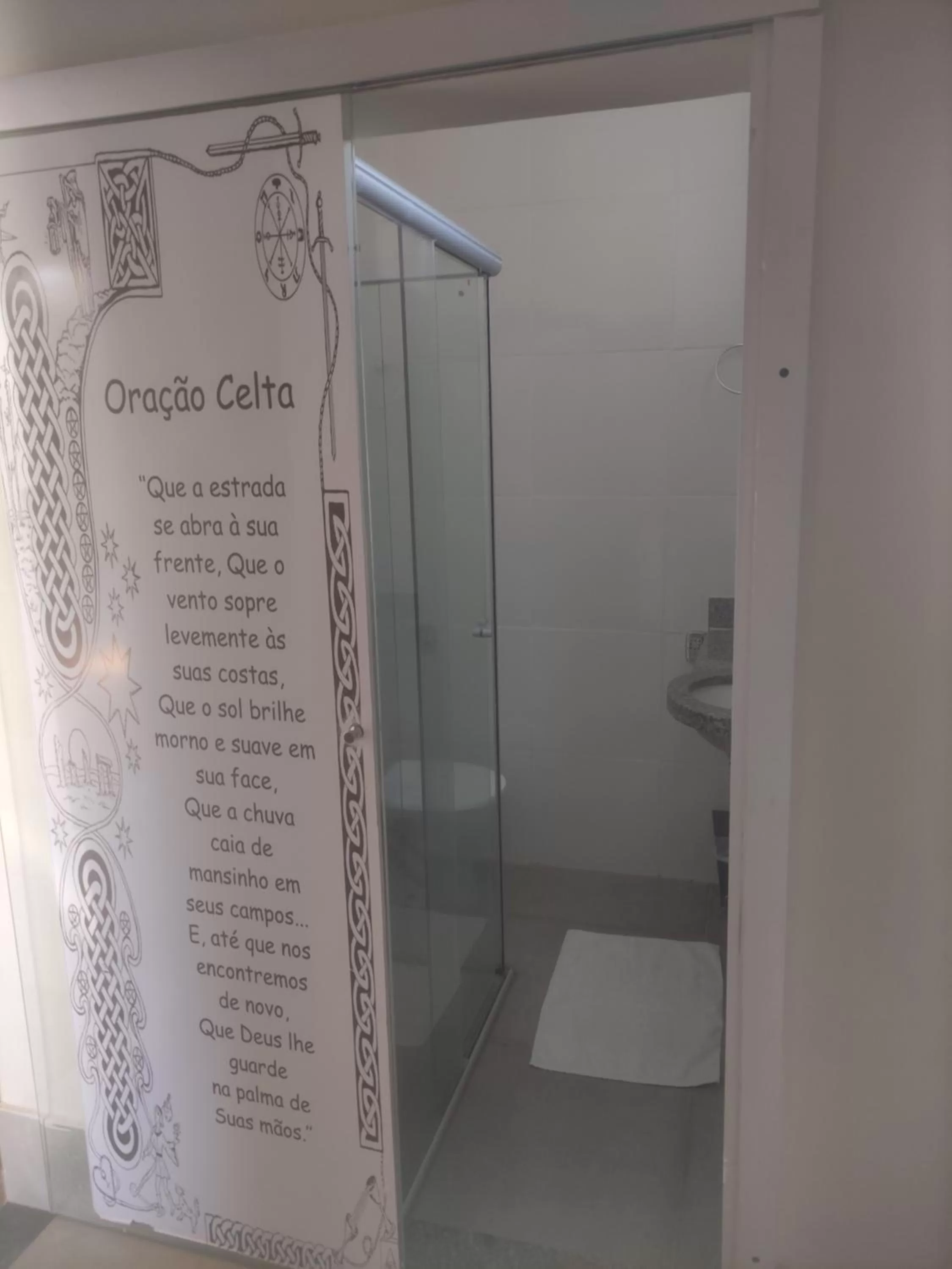 Bathroom in Pousada da Gi Suítes e Turismo