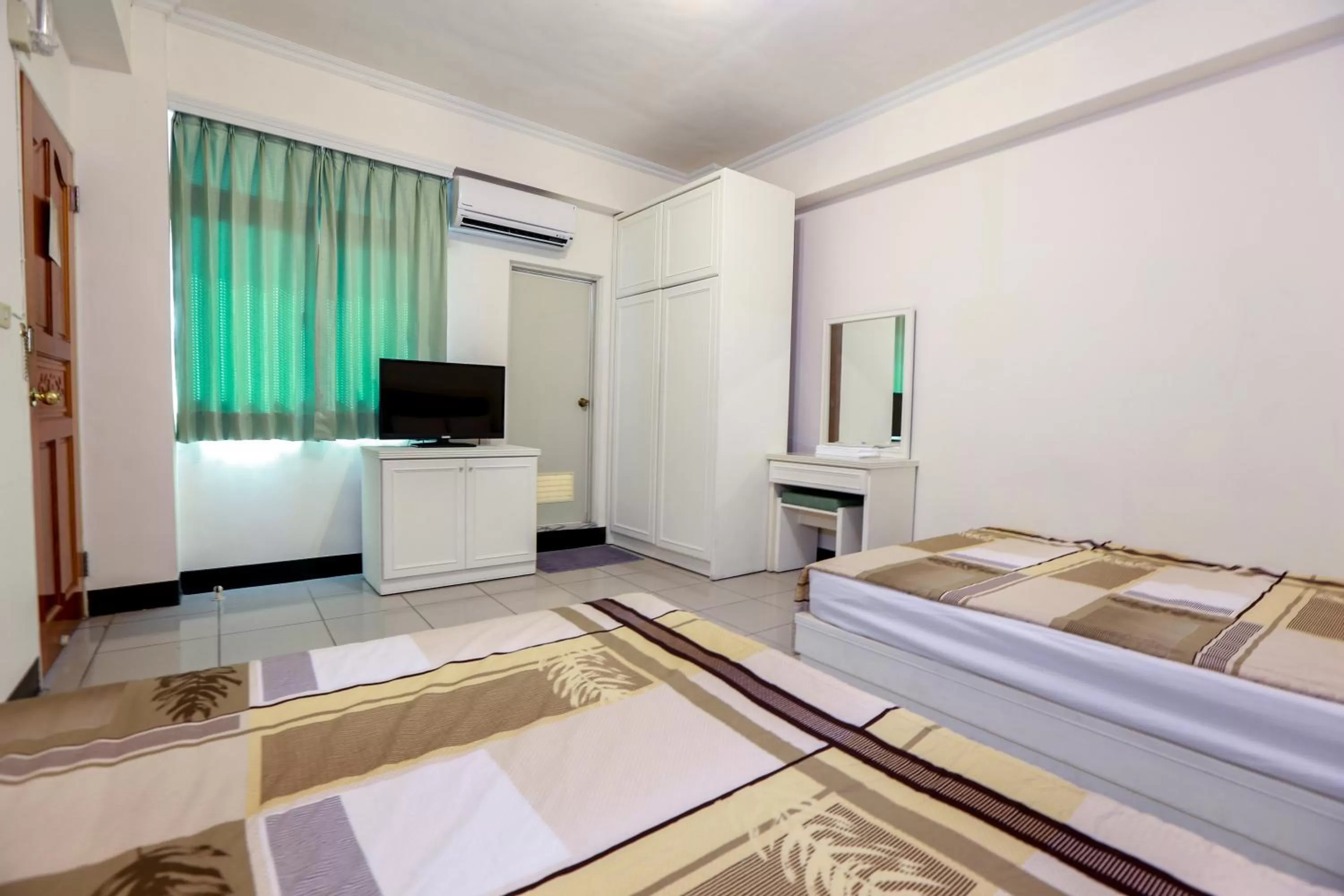 Photo of the whole room, TV/Entertainment Center in Yuan-Yee Homestay