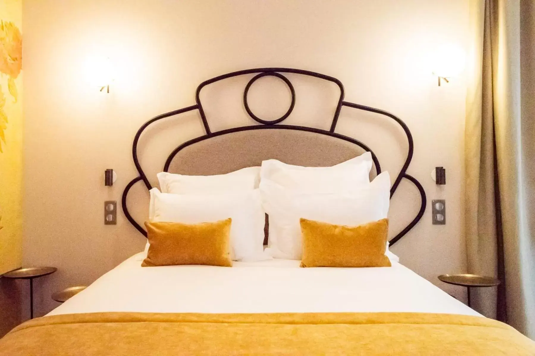 Bed in Hotel des Iris