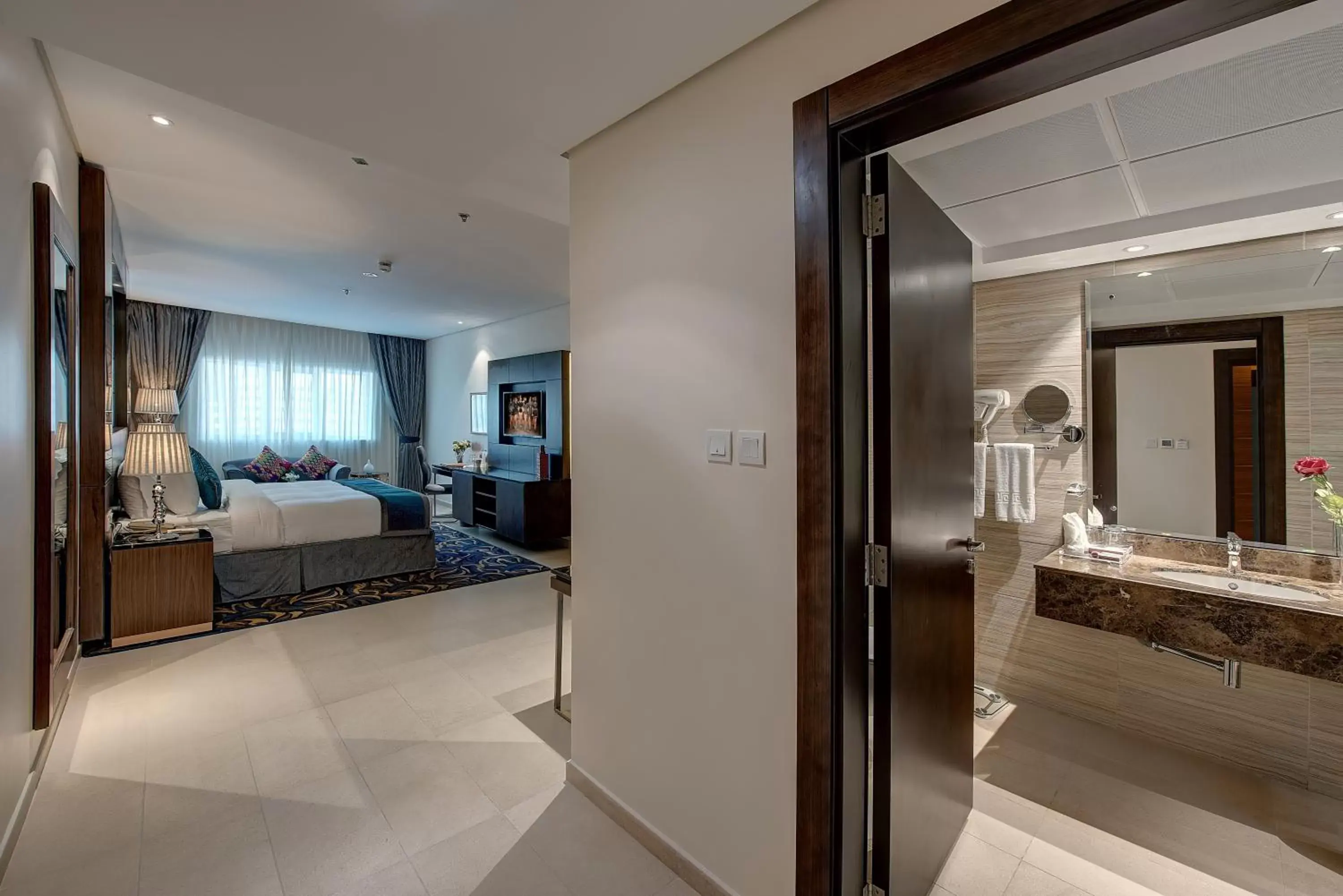 Bedroom, Bathroom in Omega Hotel Dubai