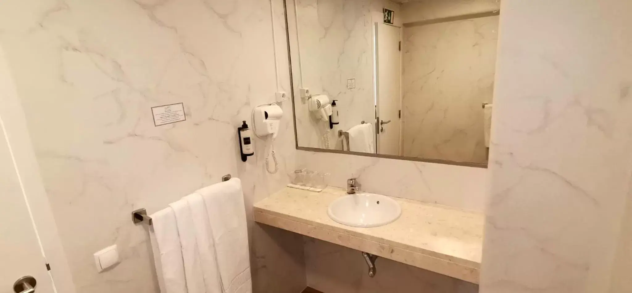 Bathroom in Lisbon City Hotel by City Hotels