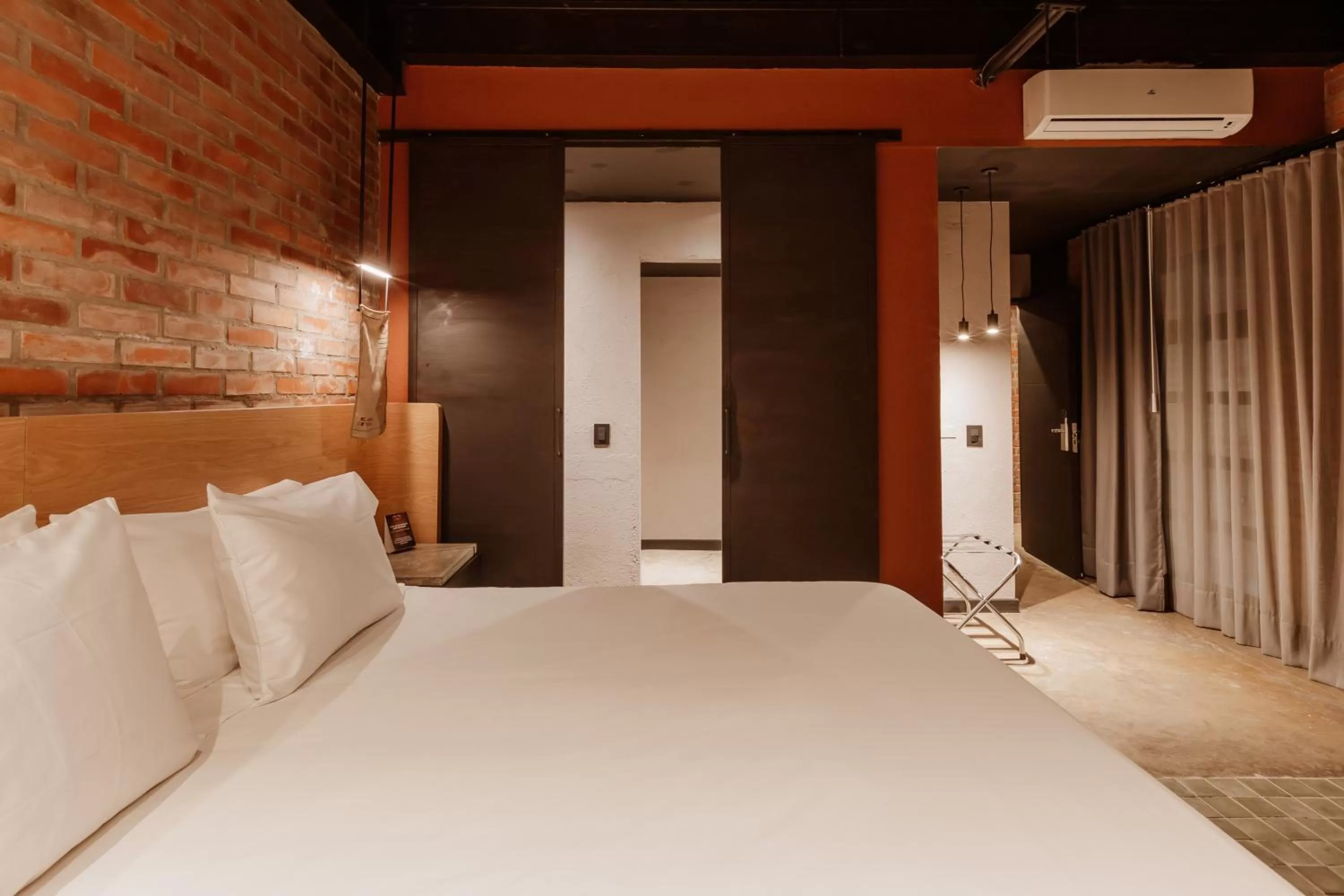 Bed in The Art Hotel Medellin