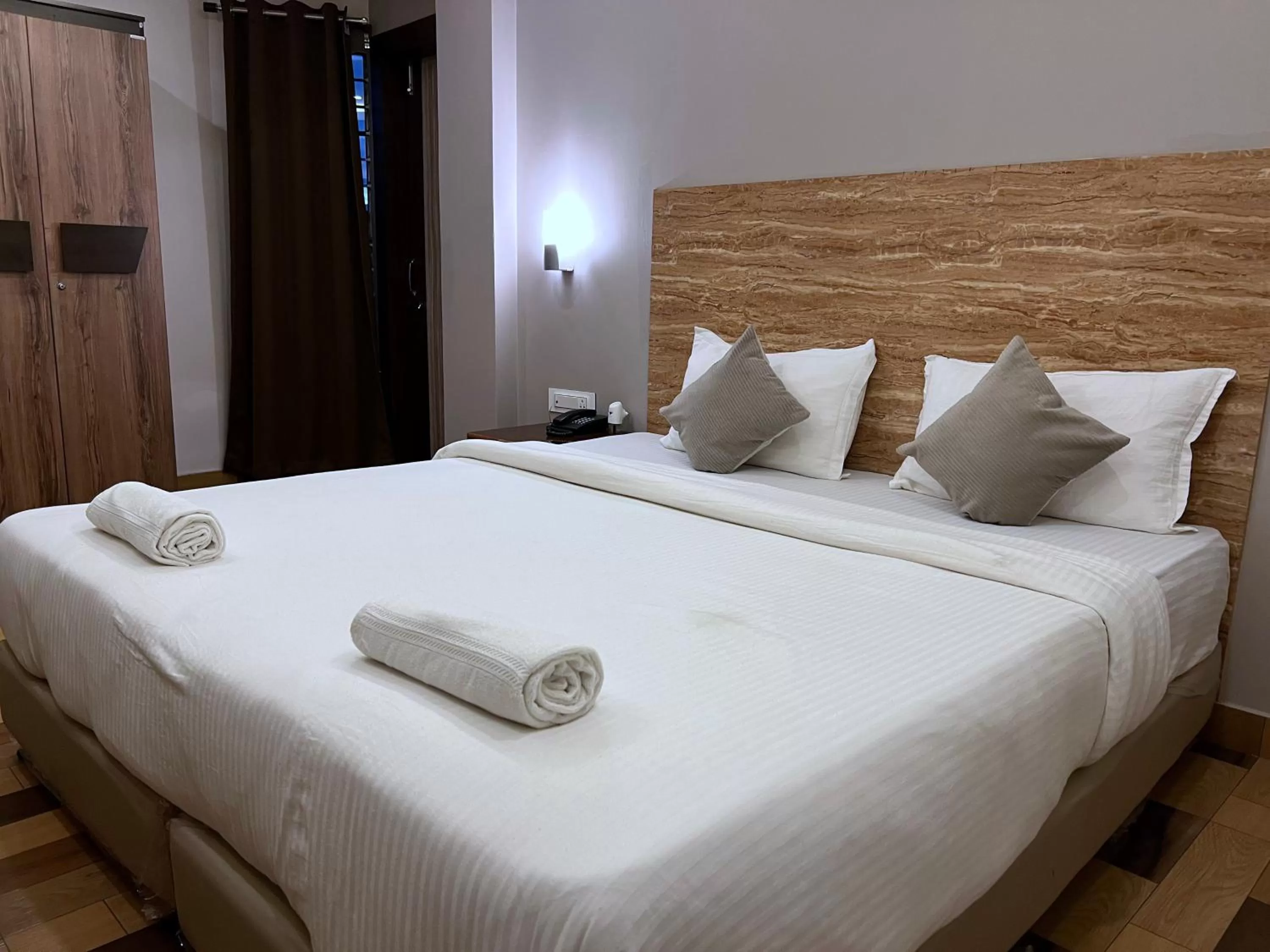 Bed in The Phoenix Residency