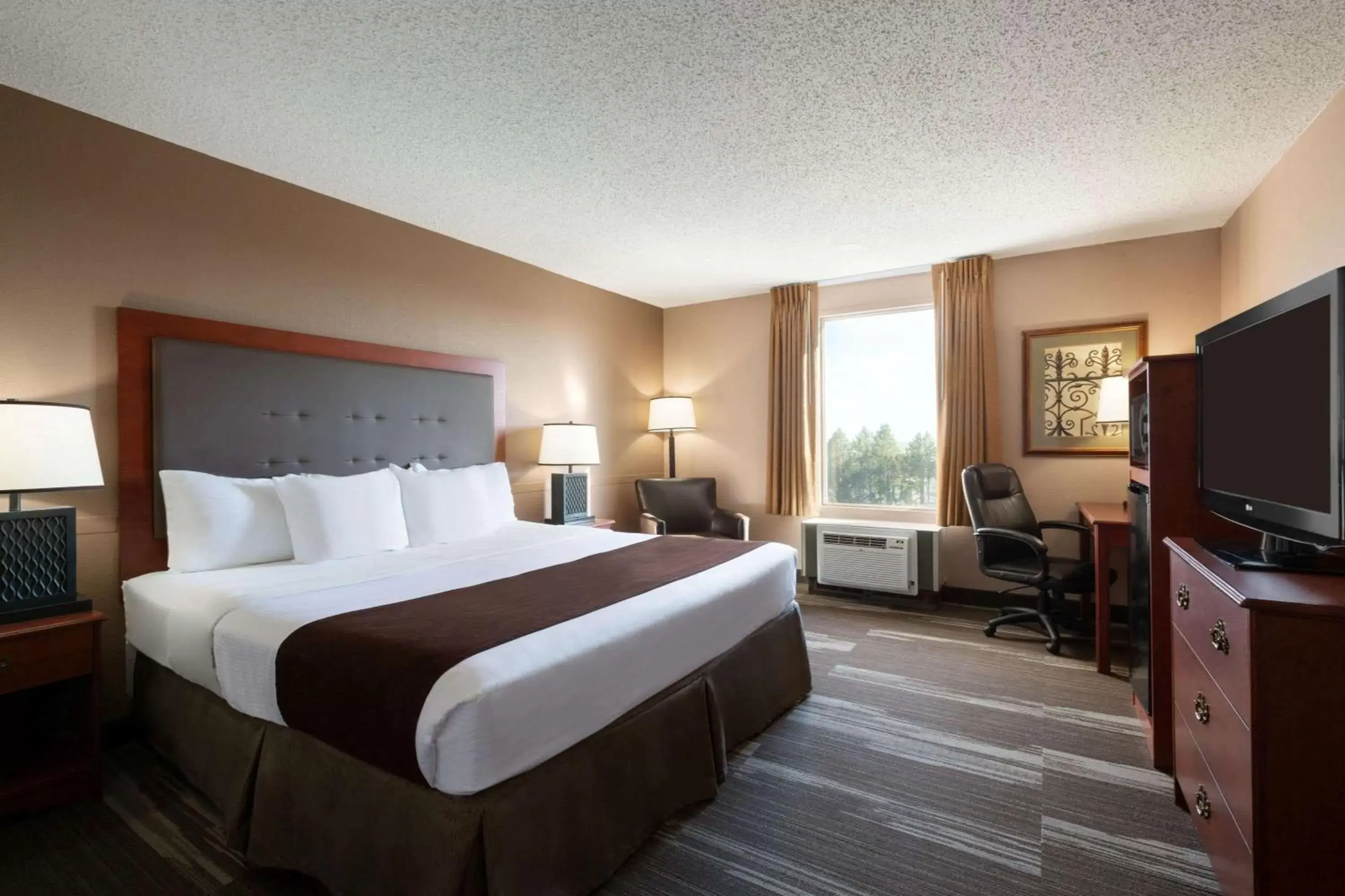 Photo of the whole room, Bed in Baymont by Wyndham Mandan Bismarck Area Photo of the whole room, Bed in Baymont by Wyndham Mandan Bismarck Area