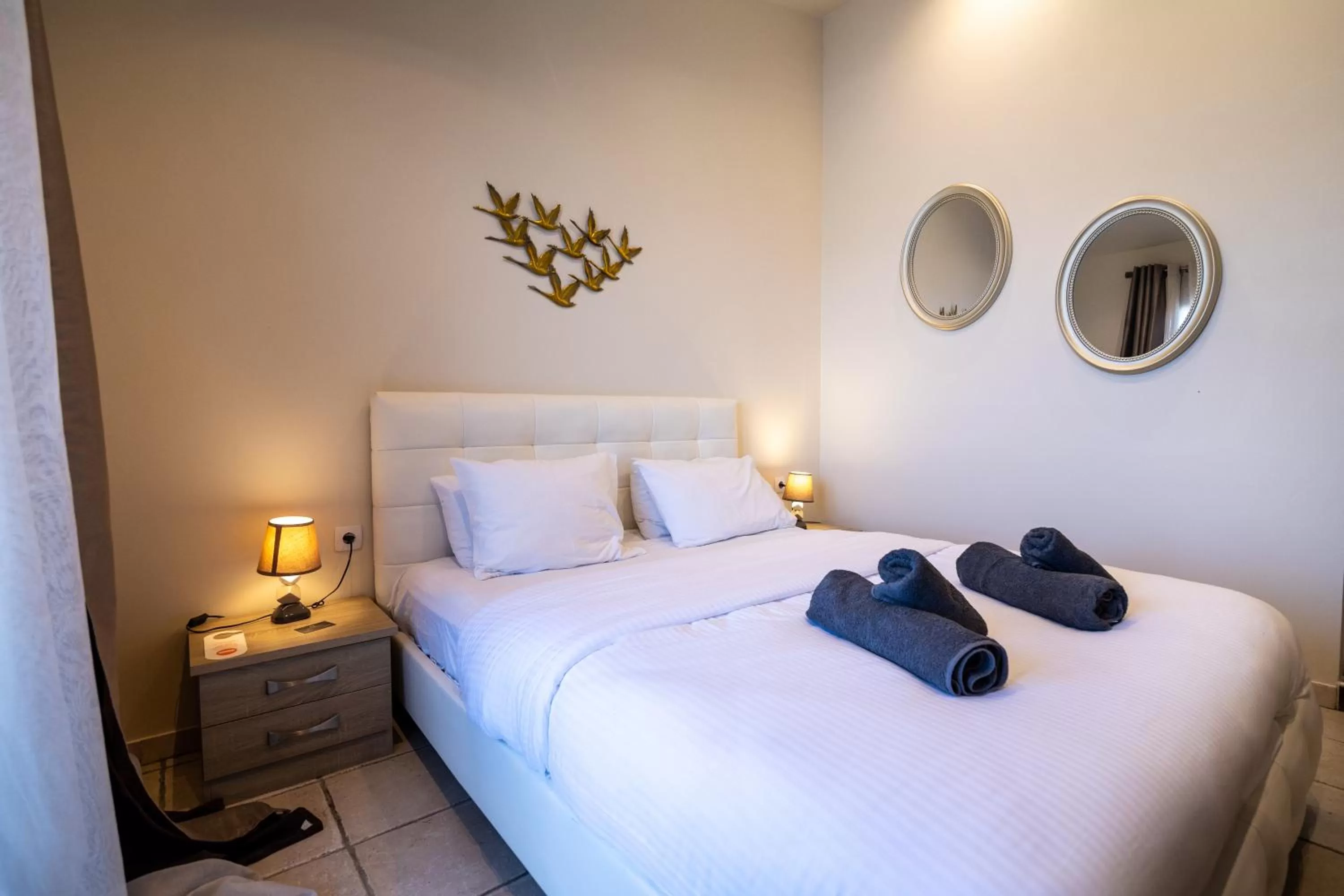 Bed in Votsalakia Hotel & Luxury Apartments