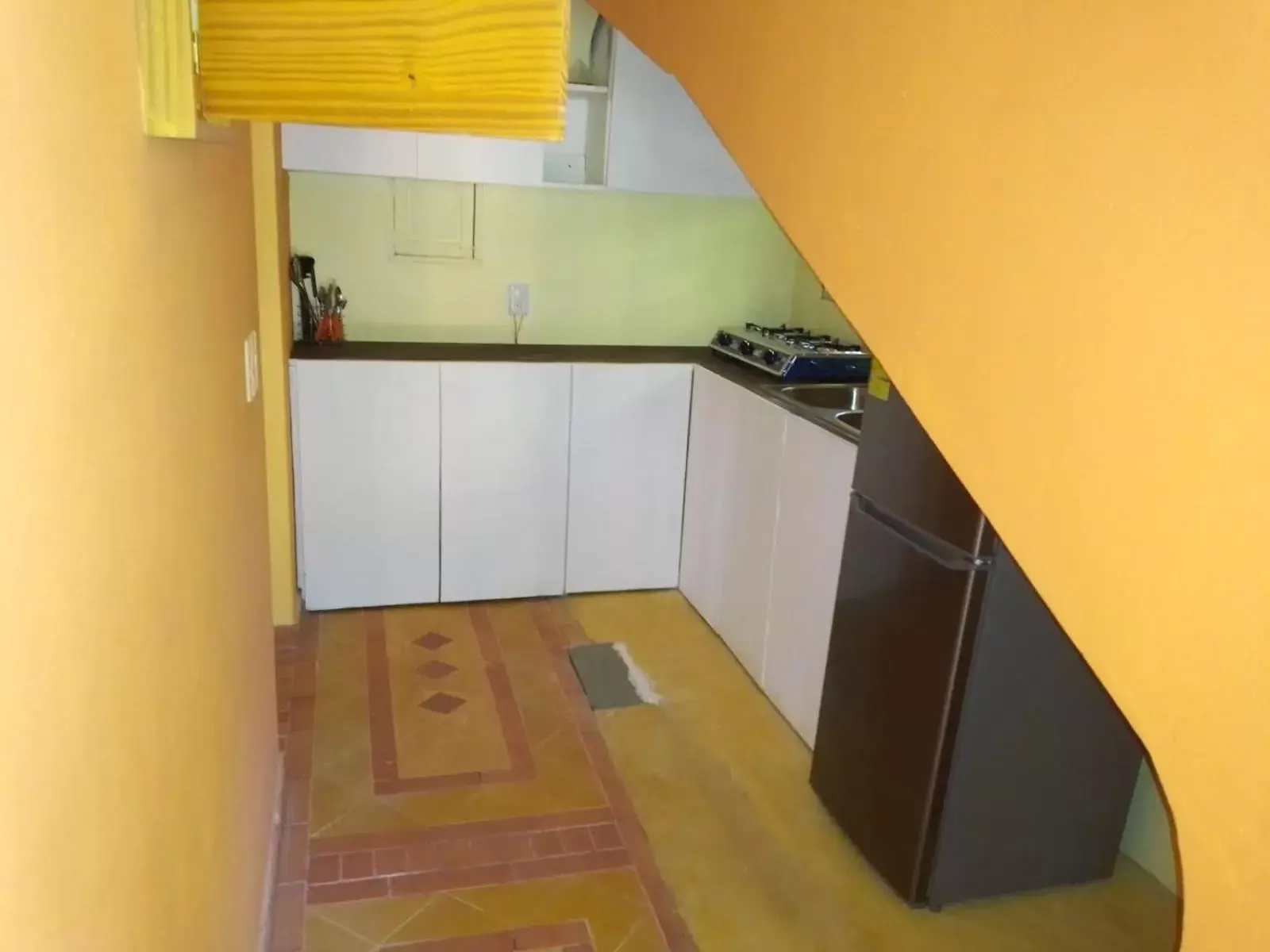 Kitchen/Kitchenette in Hotel - Residencial Madrugada