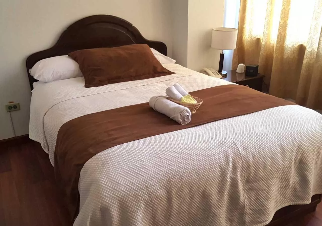 Photo of the whole room, Bed in La Merced Plaza Hospedaje