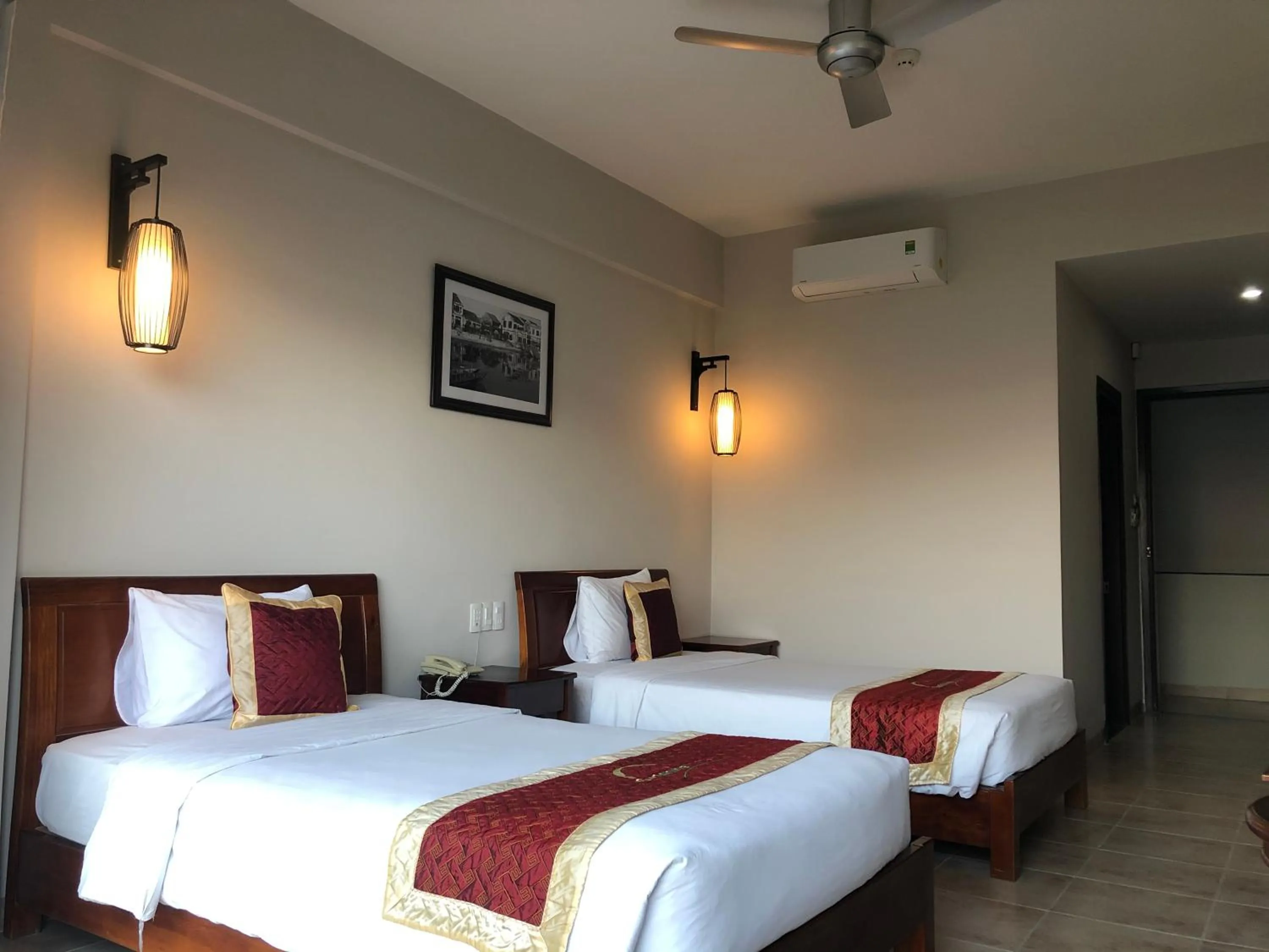 Bed in Sunshine Hoian Hotel