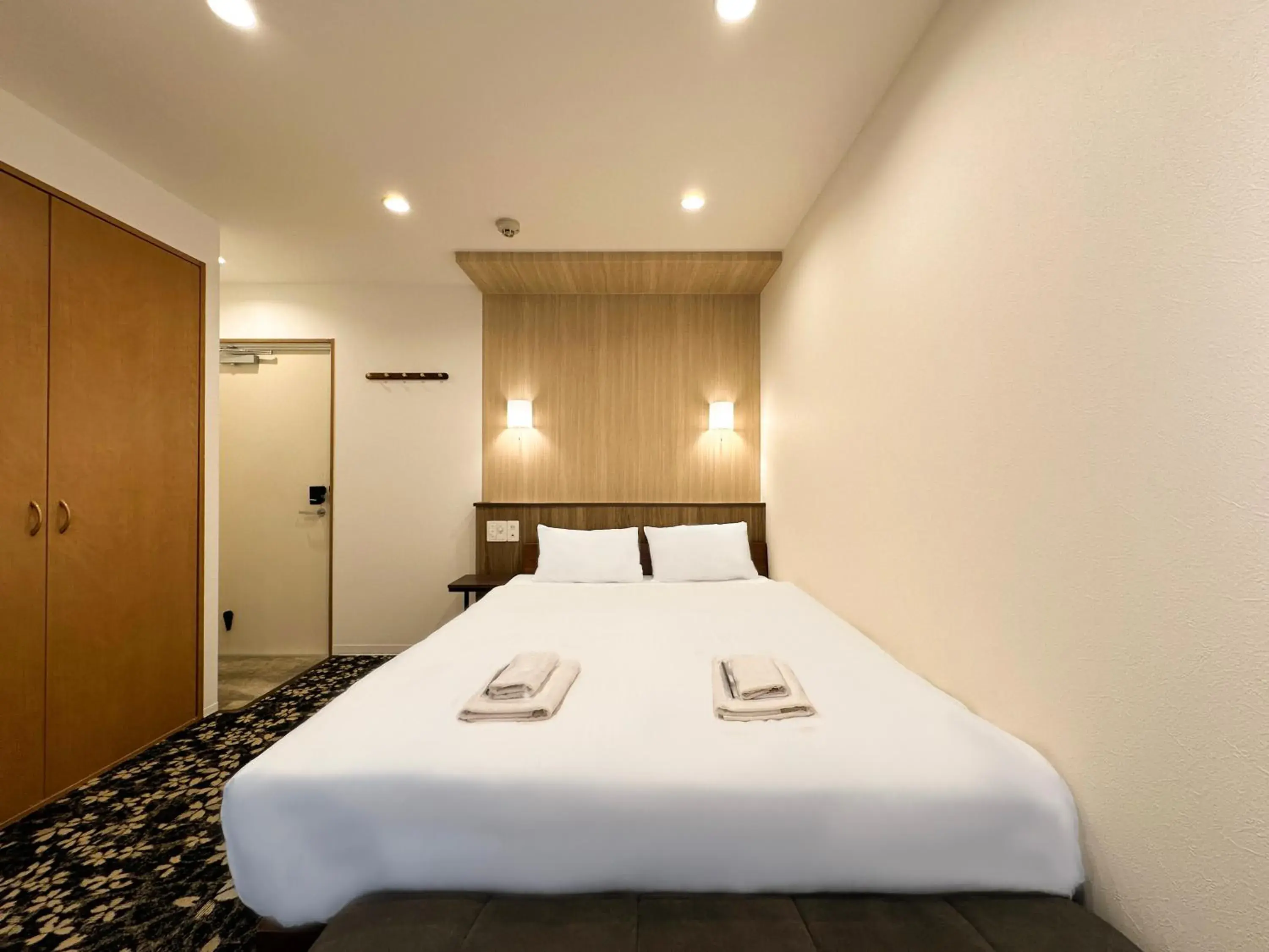 Bed in OSAKA EBISU HOTEL