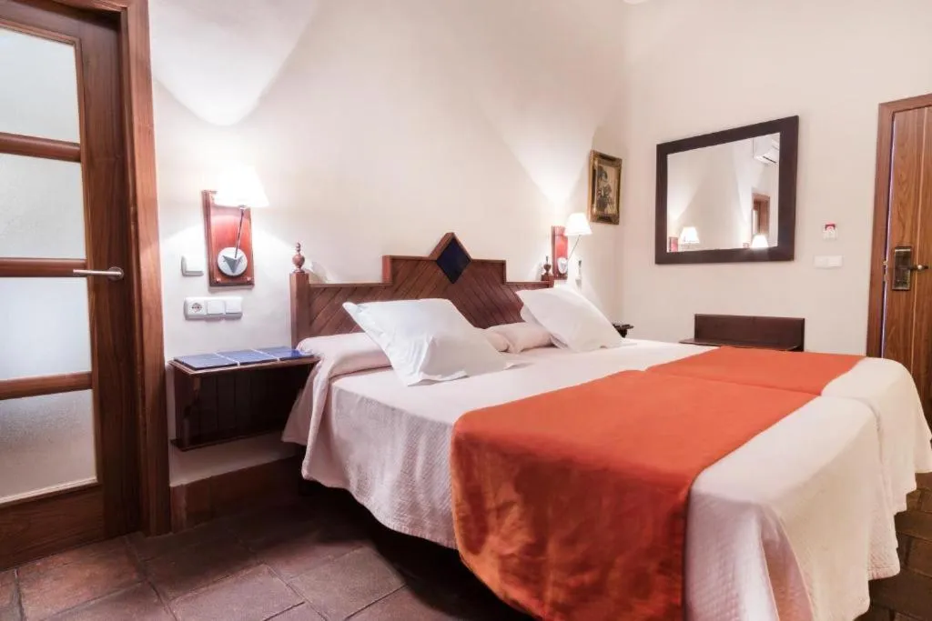 Photo of the whole room, Bed in Casa Palacio Pilar del Toro