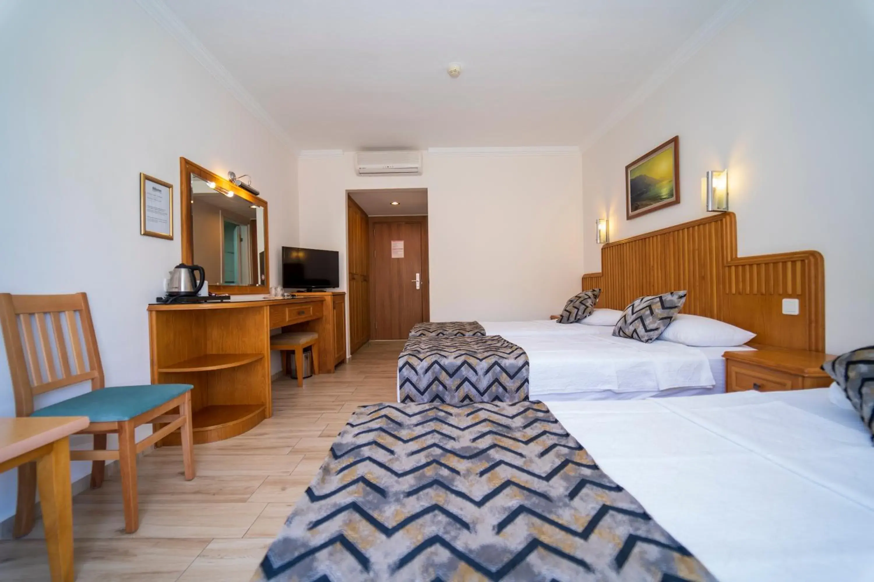 Bed in Belcehan Deluxe Hotel