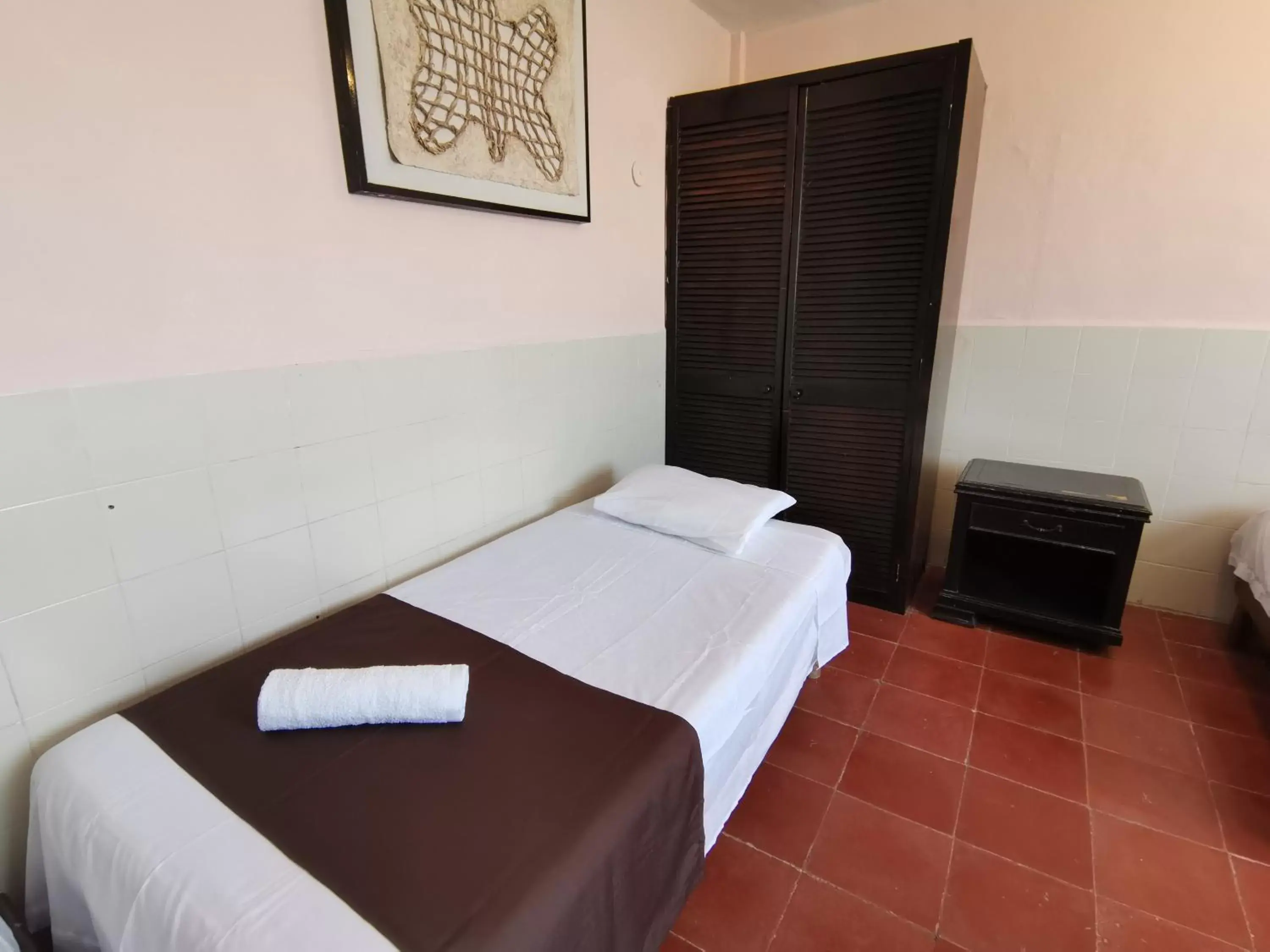 Bed in Hotel Colonial San Carlos
