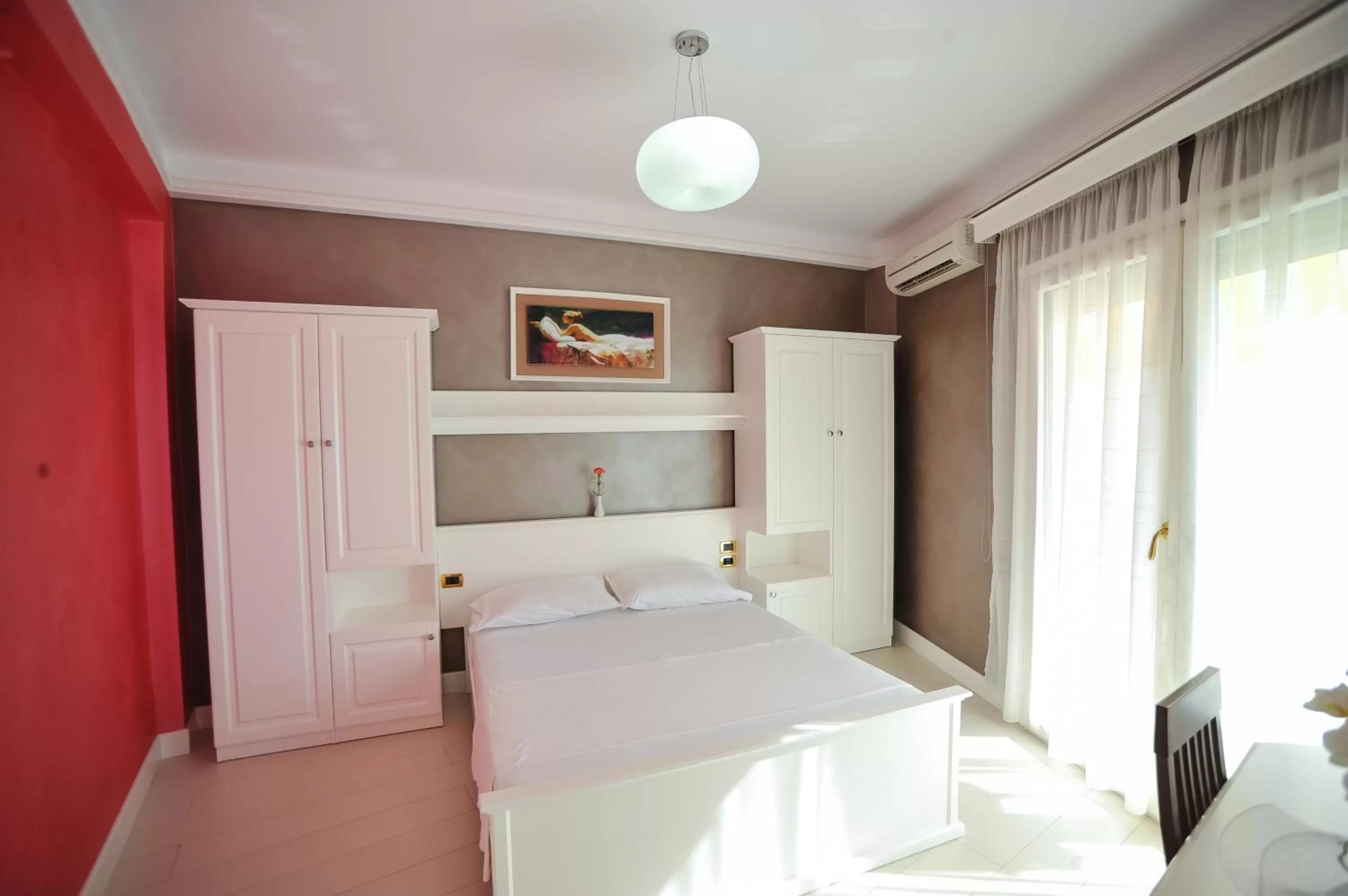 Bed in Iliria Internacional Hotel