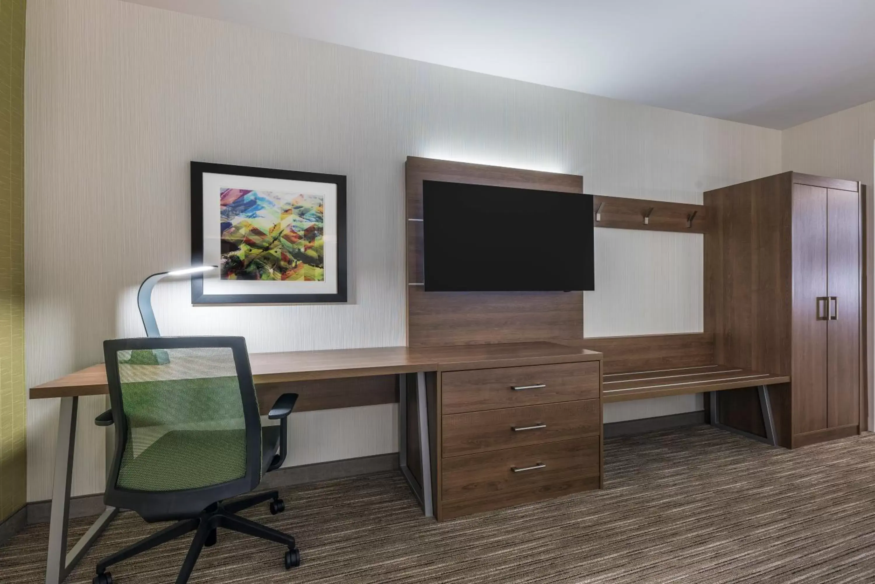 Photo of the whole room, TV/Entertainment Center in Holiday Inn Express & Suites Moncton, an IHG Hotel