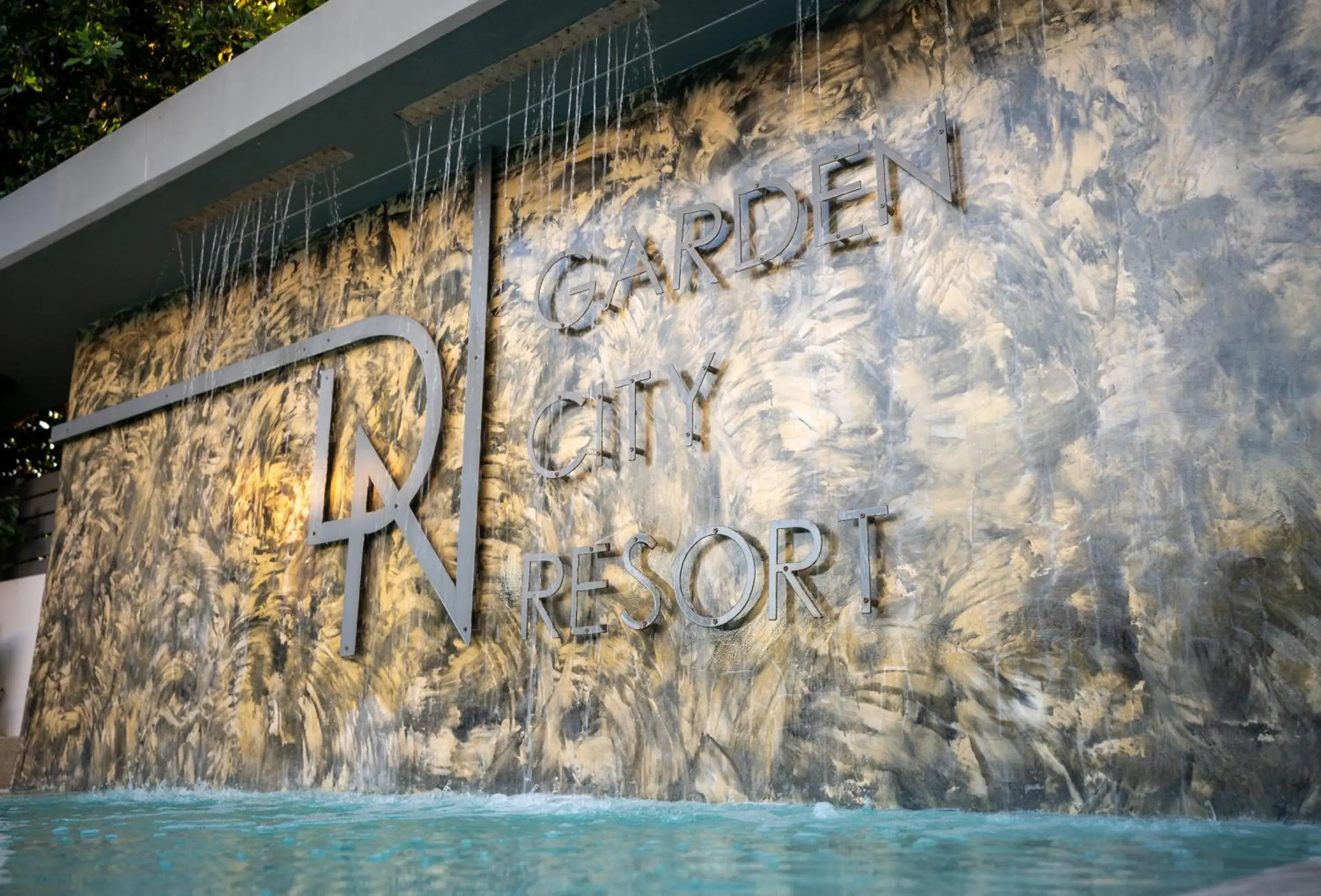 Swimming pool, Property Logo/Sign in Garden City Resort