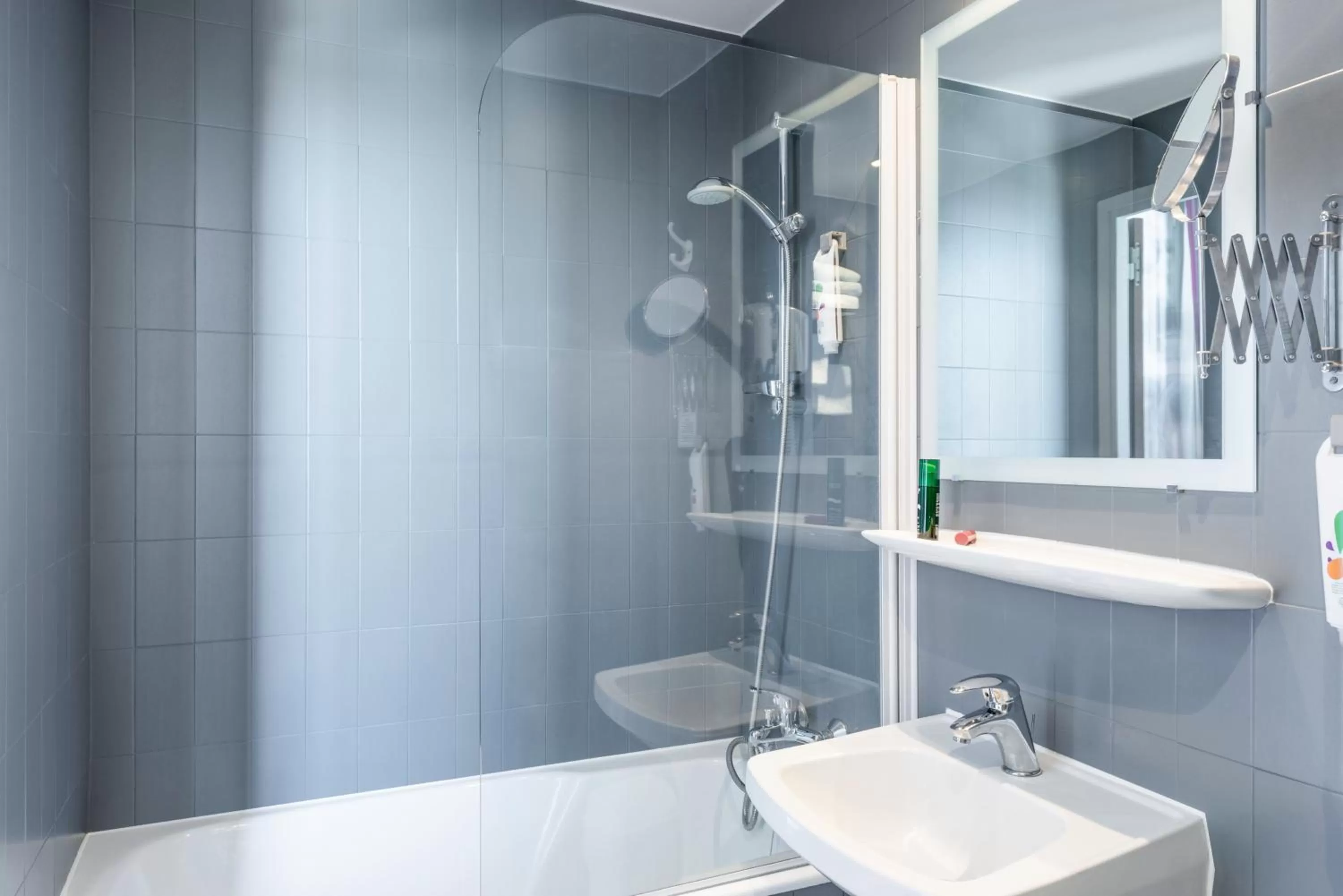 Bathroom in ibis Styles Asnieres Centre