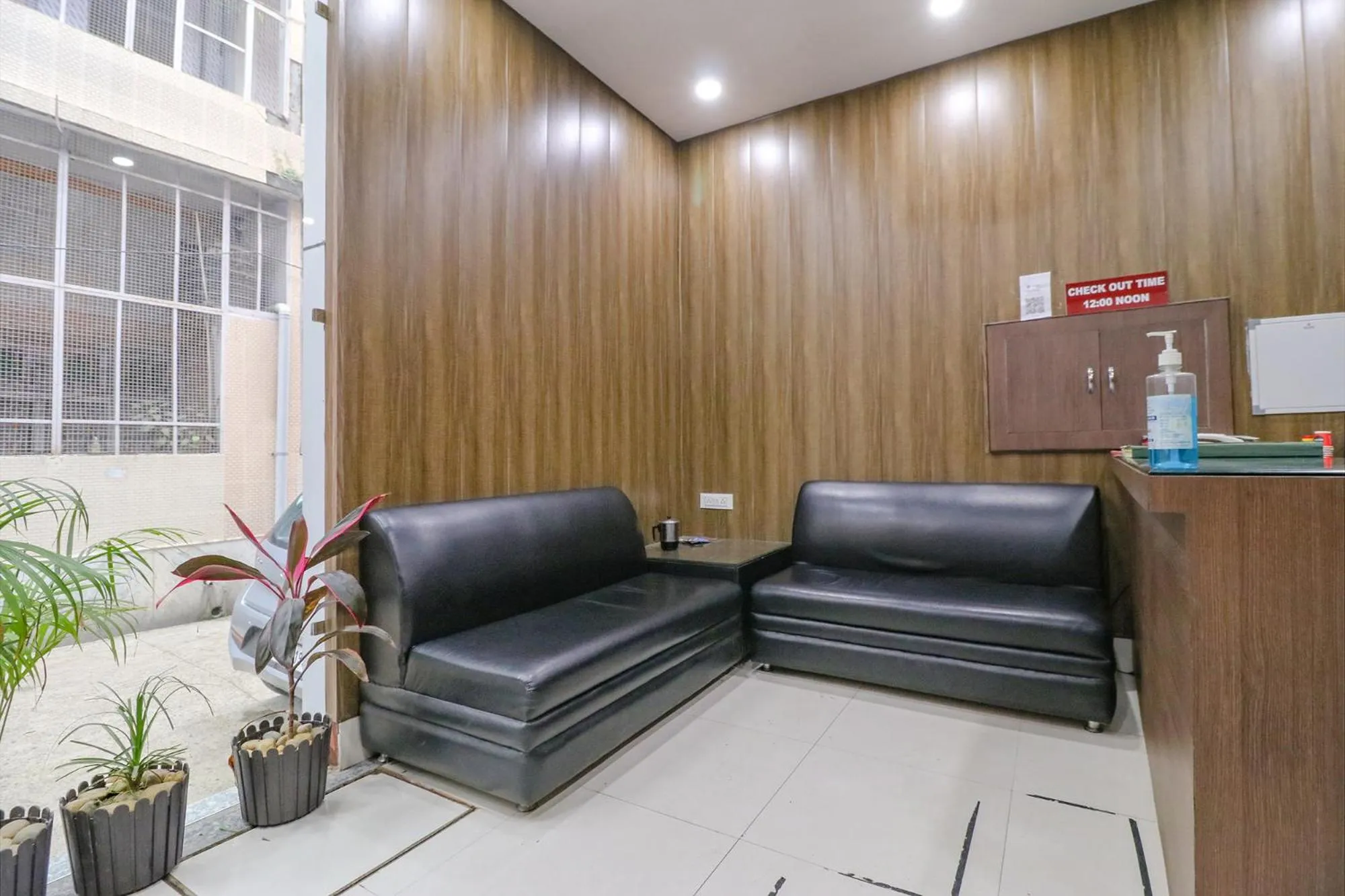 Seating area in FabExpress Kartikey Inn