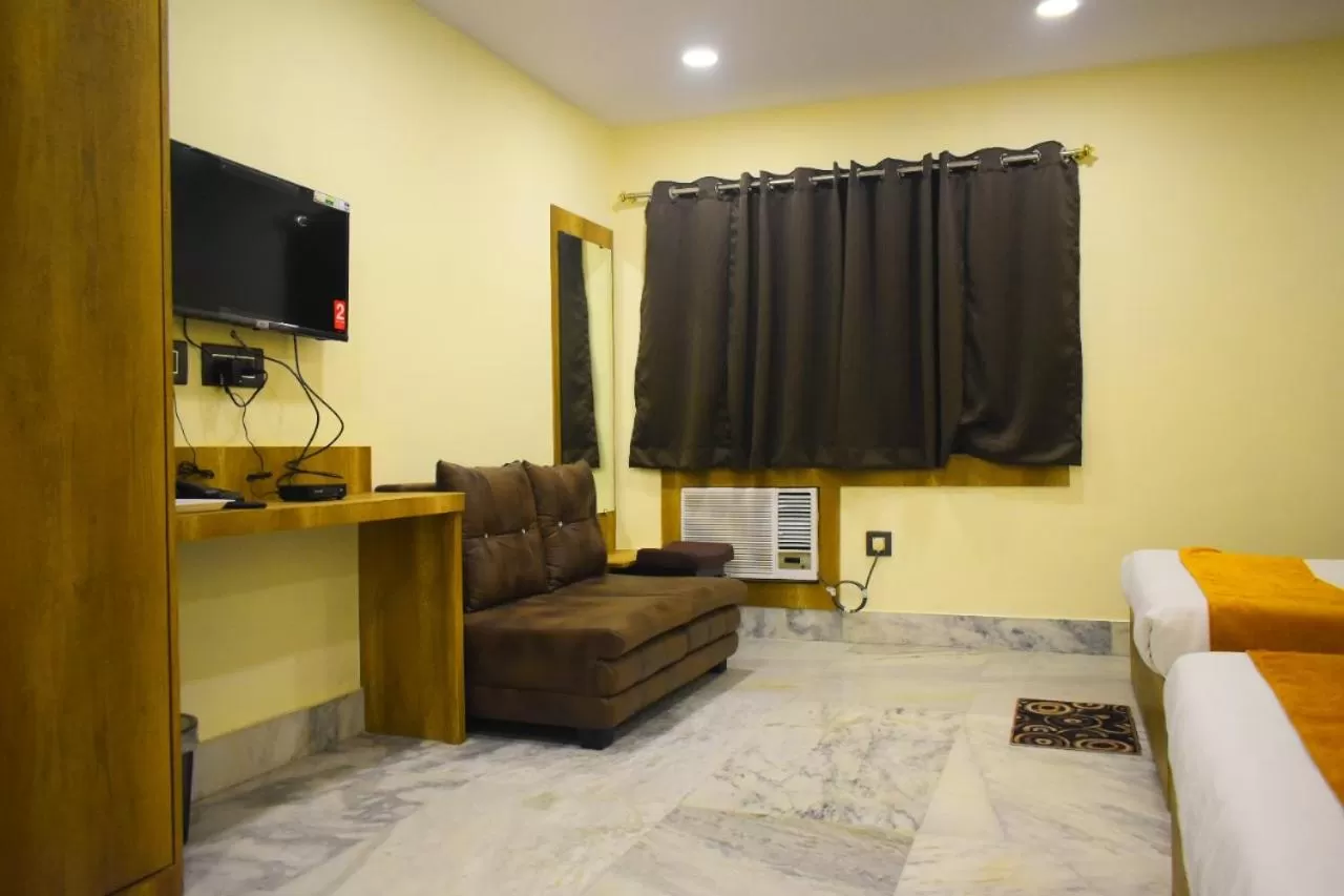 Seating area, Bed in Hotel Grand Residency