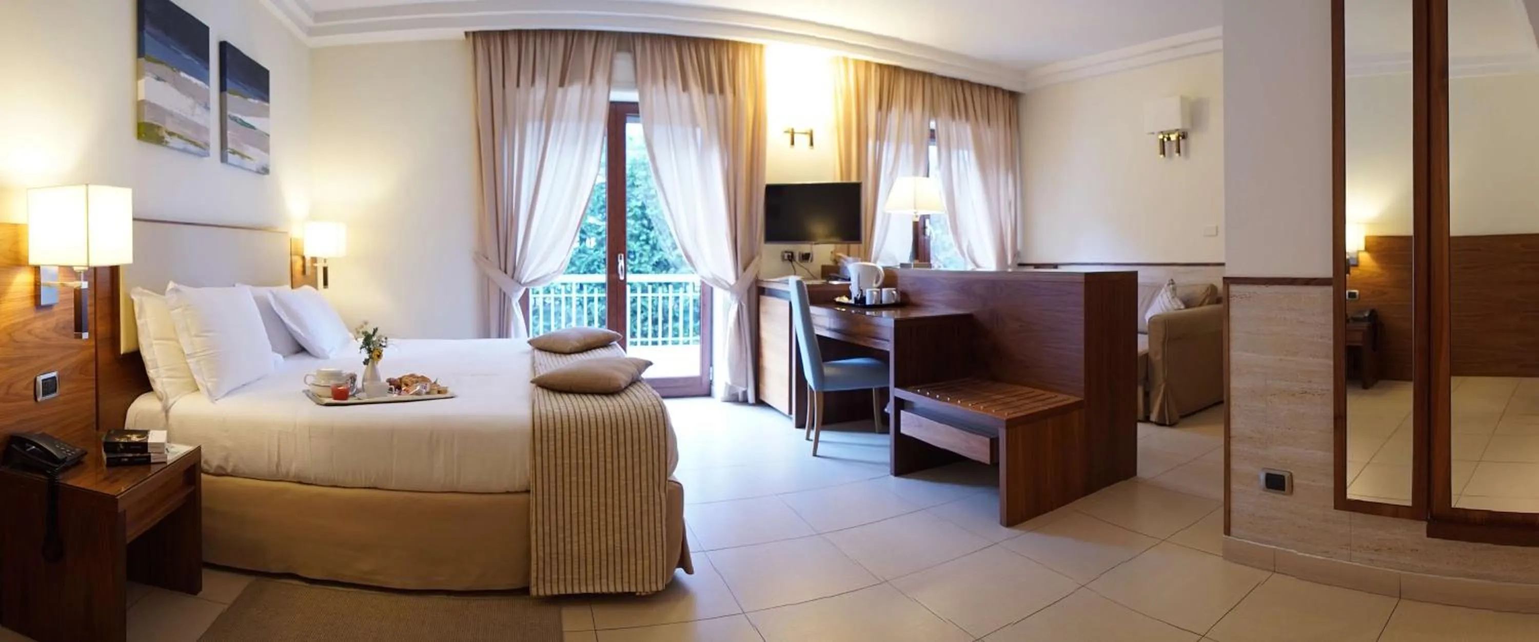 Bed in Suites & Residence Hotel