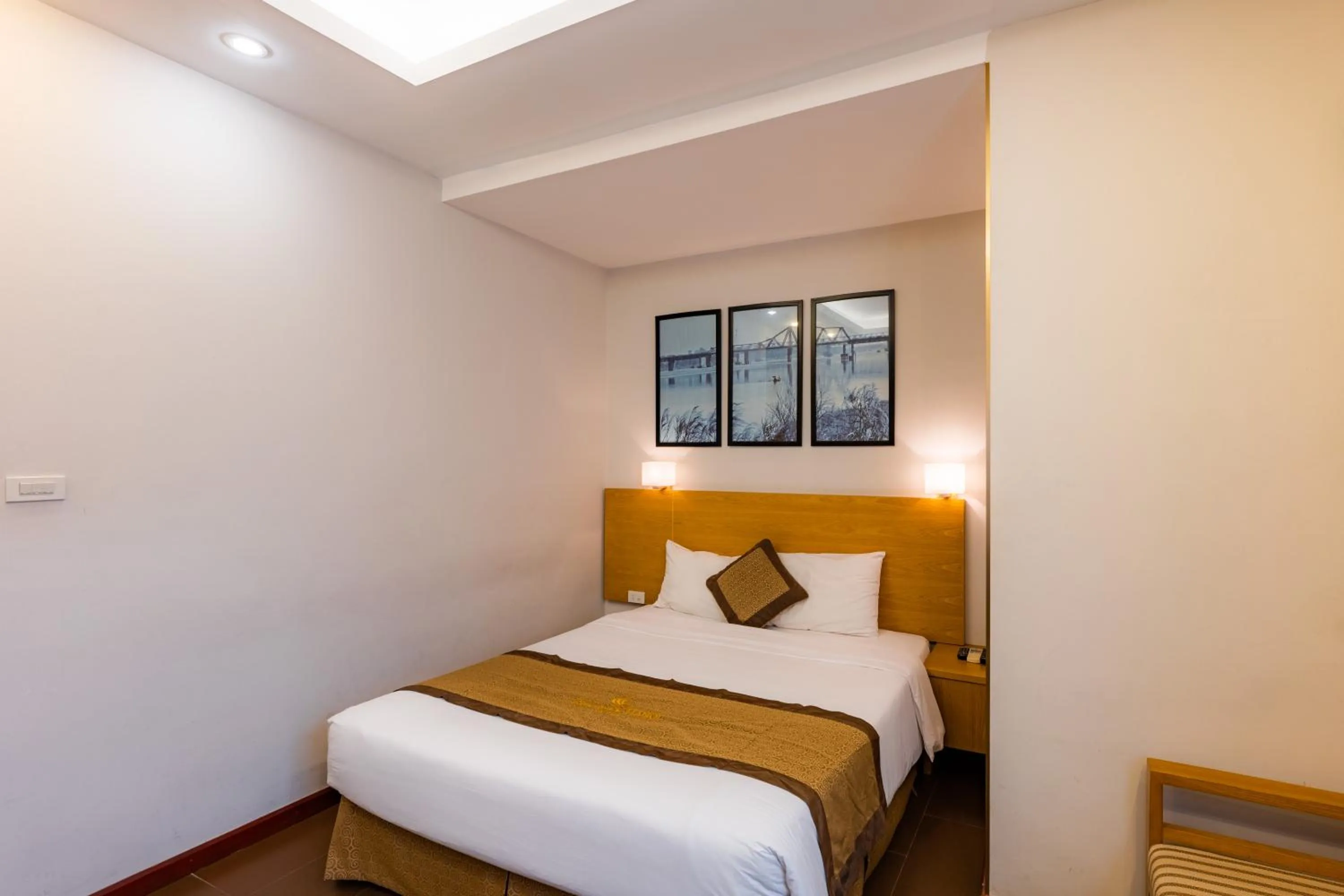 Bed in Riverside Hanoi Hotel