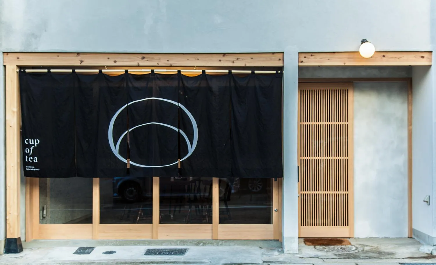 Property building in cup of tea