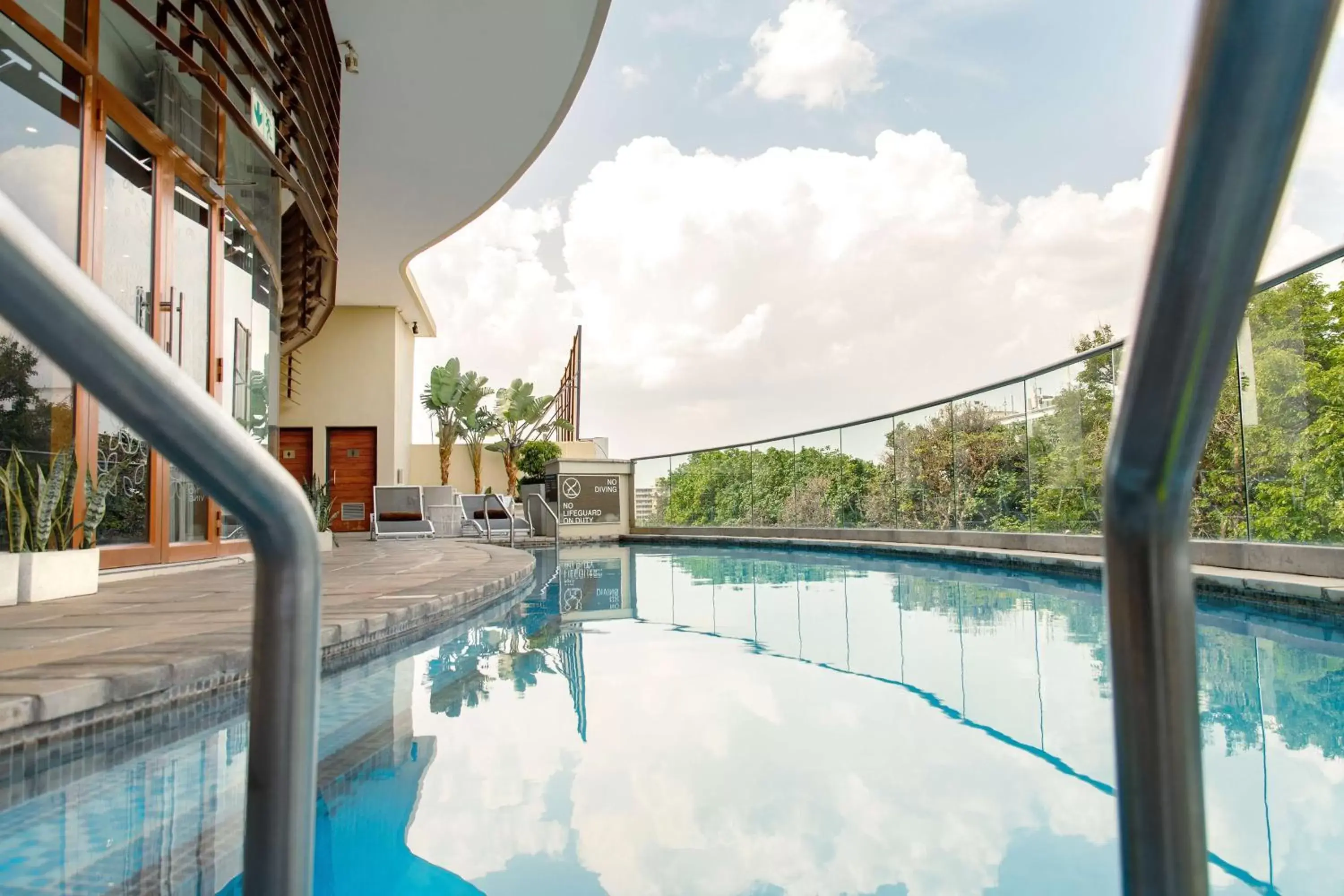 Pool view, Swimming Pool in Hilton Garden Inn Society Business Park