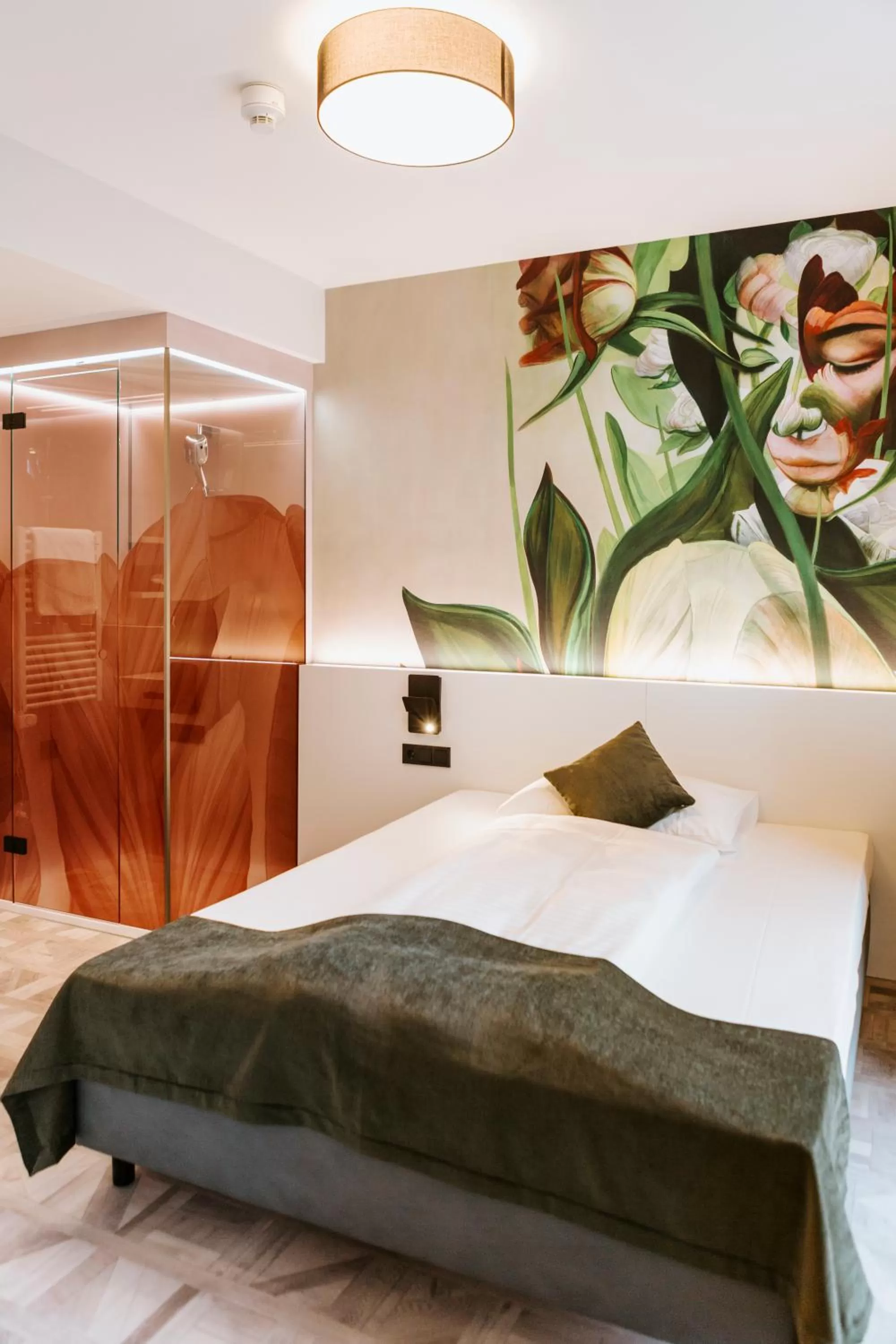 Bed in ART-INN Design Self-Check-in-Hotel