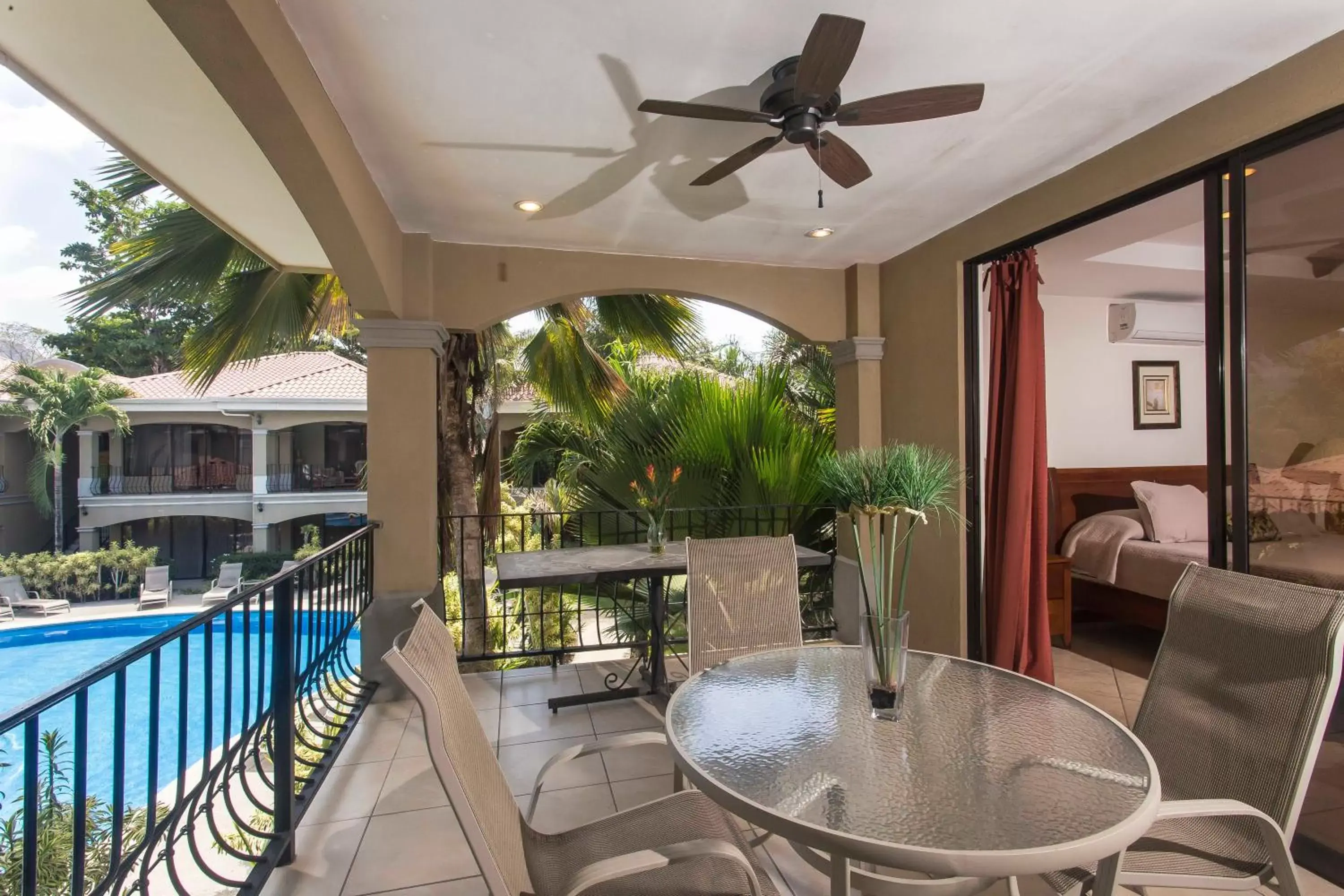 Balcony/Terrace, Pool View in Monte Carlo Luxury Condominiums