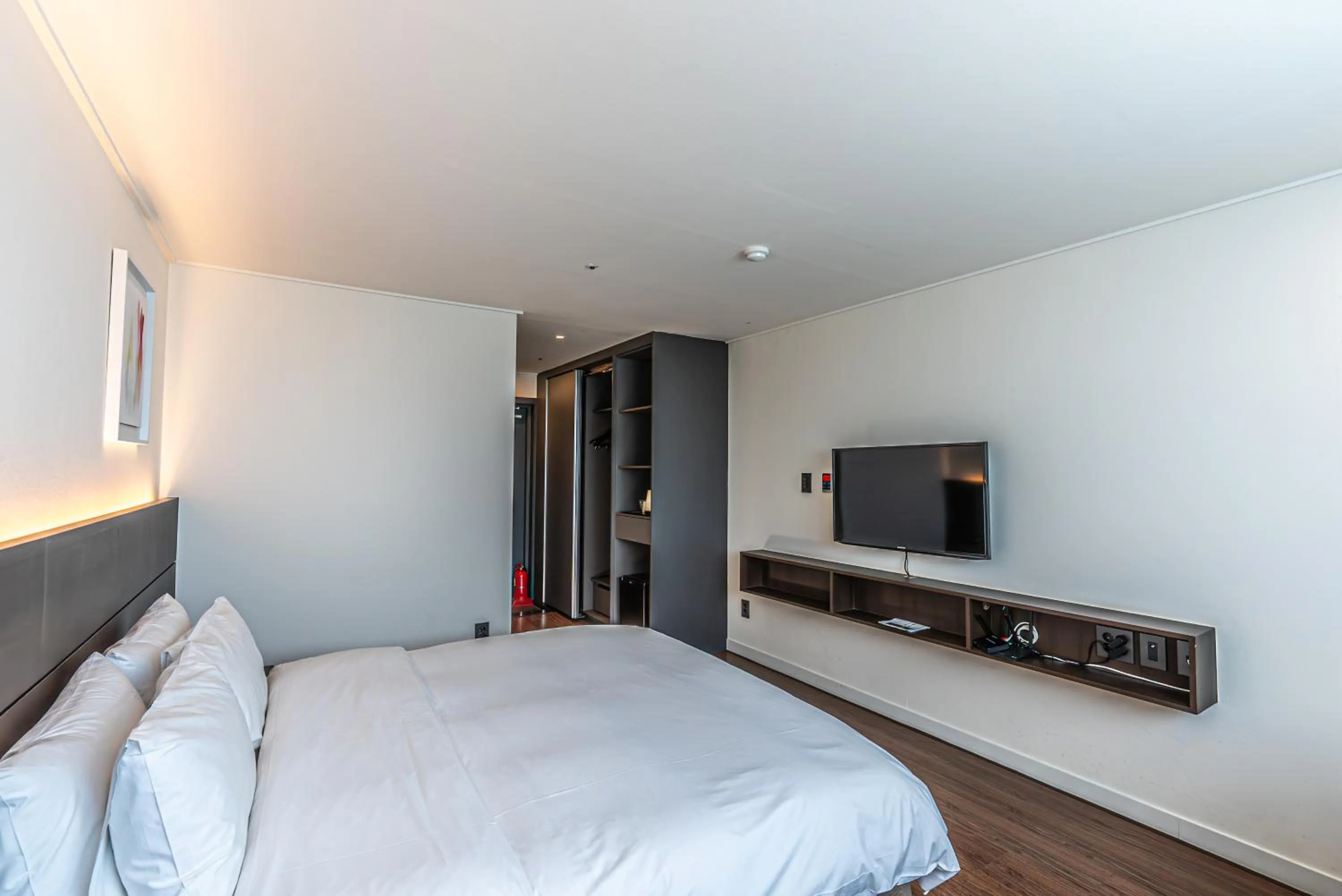 Bed in Hotel The Grang Jungmun