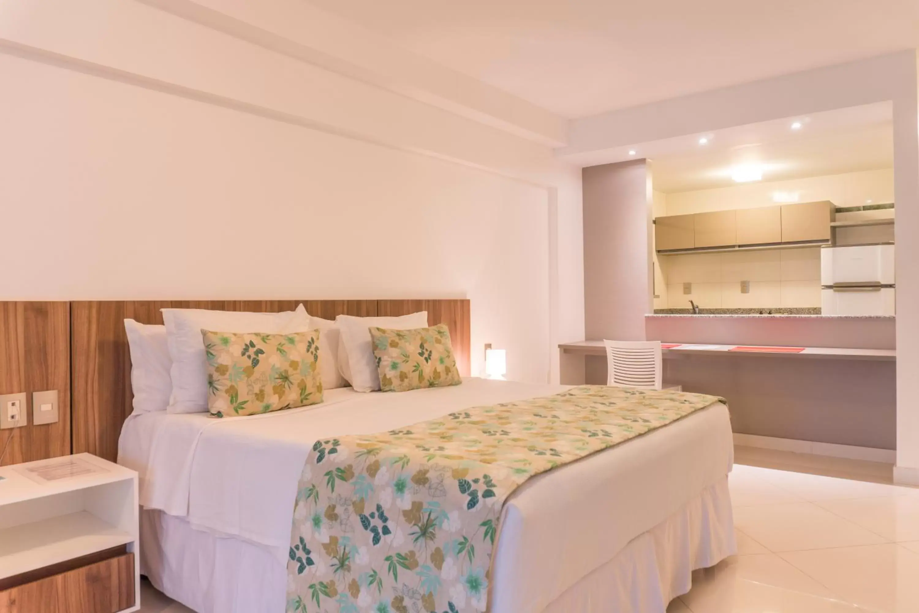 Kitchen or kitchenette, Bed in Kristie Resort Natal Hotel