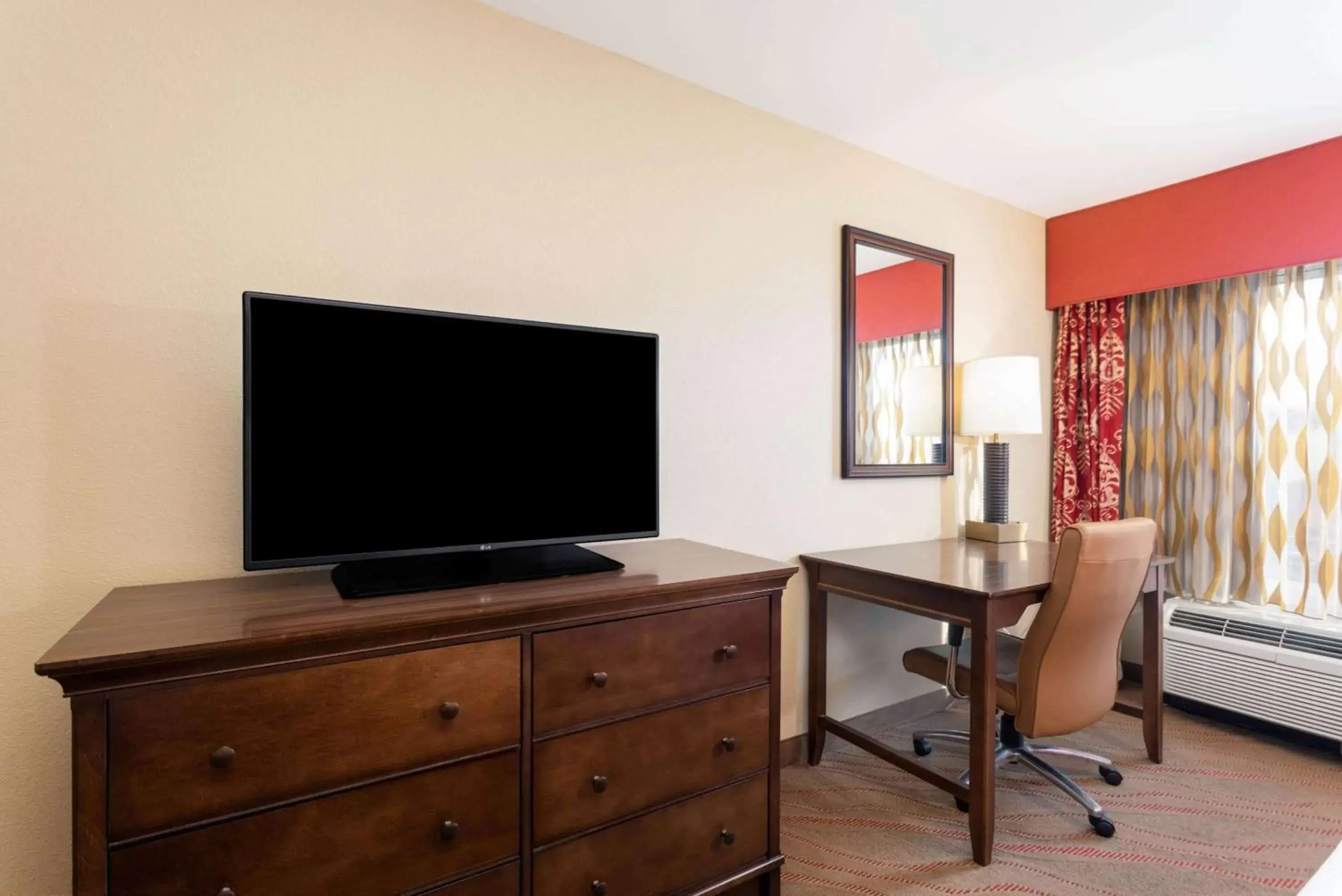 Photo of the whole room, TV/Entertainment Center in La Quinta by Wyndham Pigeon Forge