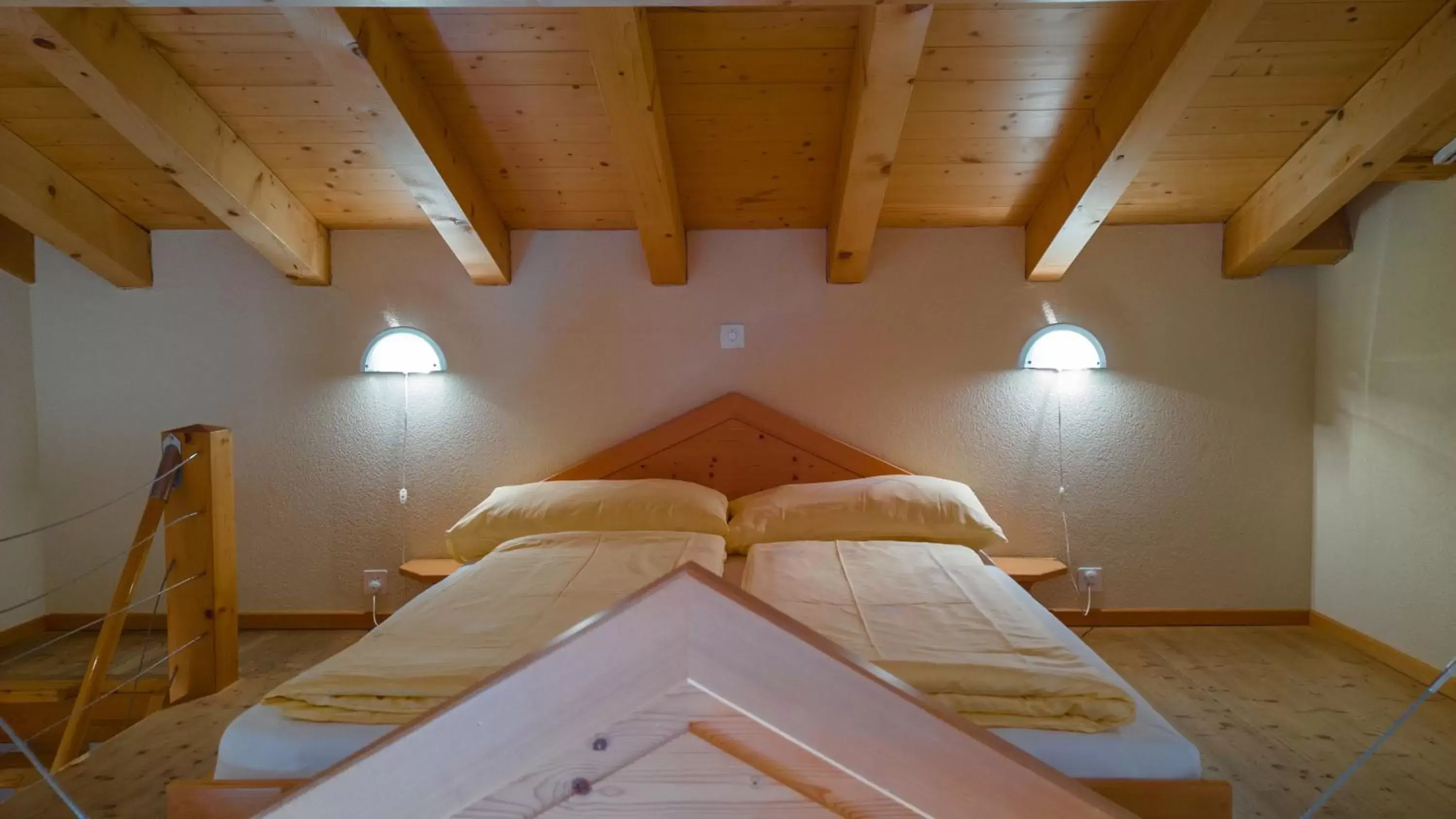 Bed in Hotel Central Wolter - Grindelwald