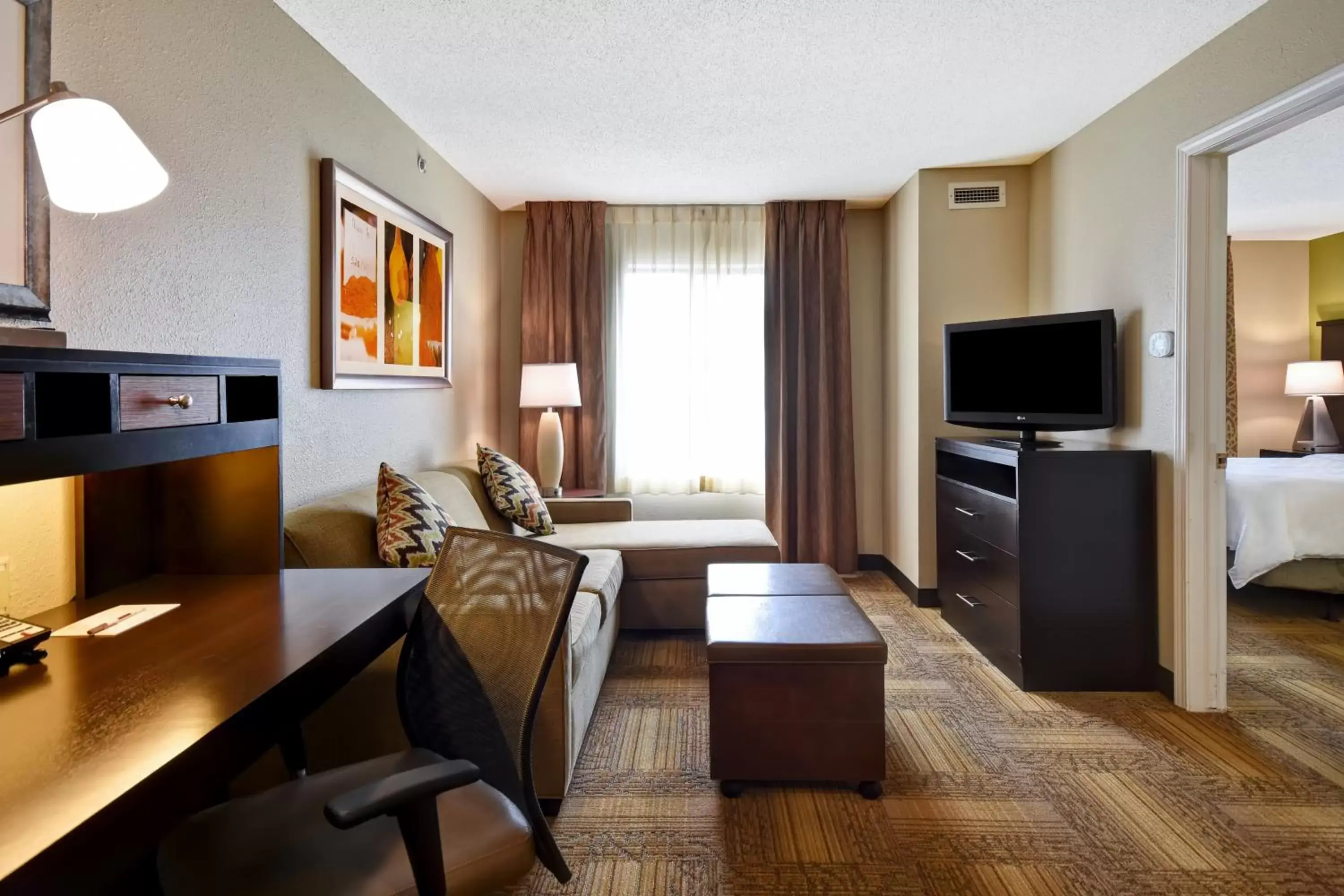 Photo of the whole room, Seating Area in Staybridge Suites Grand Rapids-Kentwood, an IHG Hotel