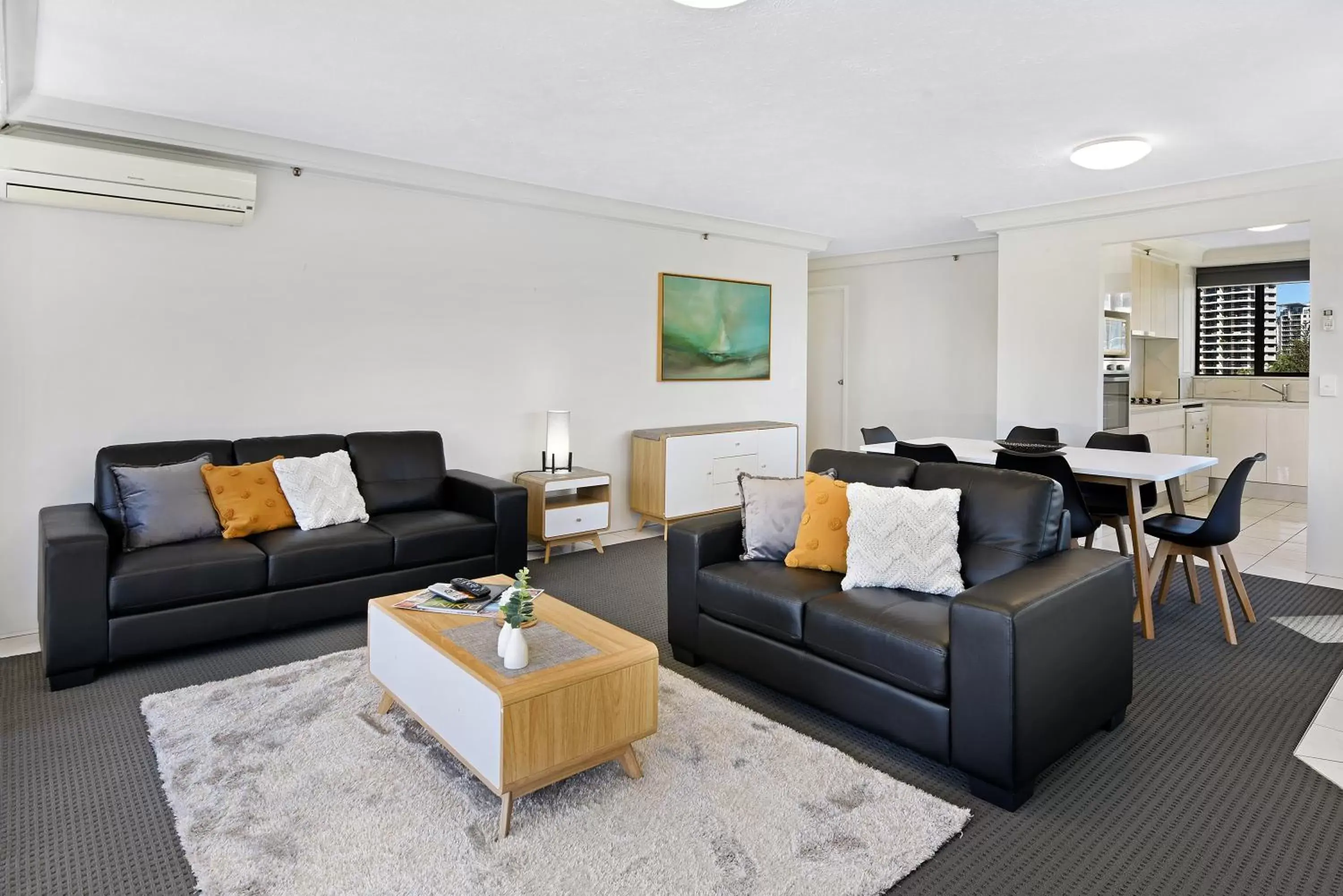 Living room, Seating Area in Surfers Century Oceanside Apartments