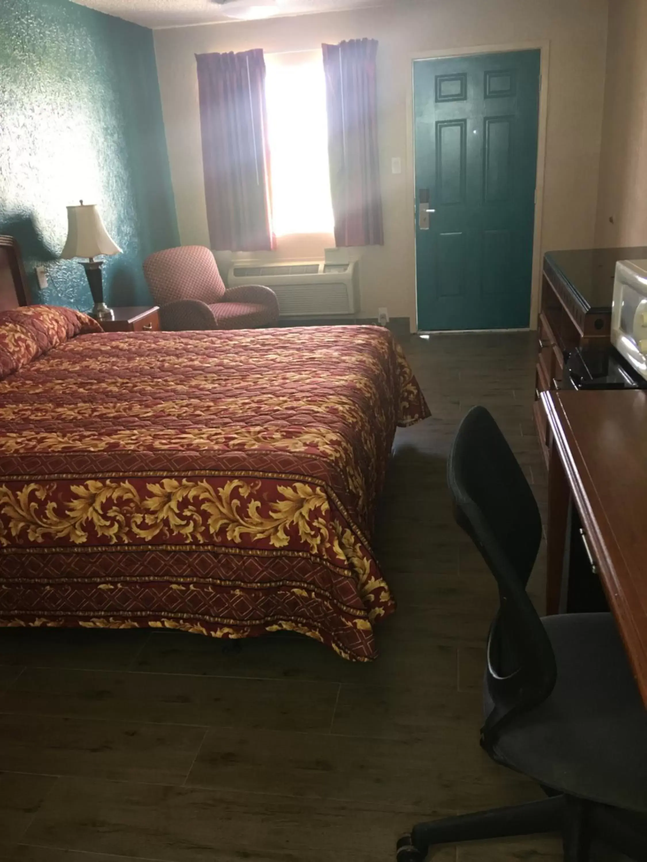 Bed in Chaparral Motel