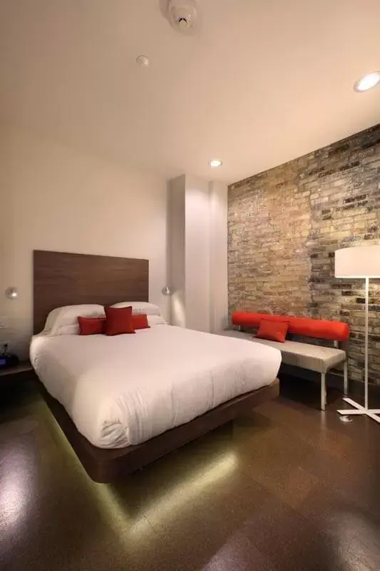 Bed in CityFlatsHotel - Grand Rapids, Ascend Hotel Collection