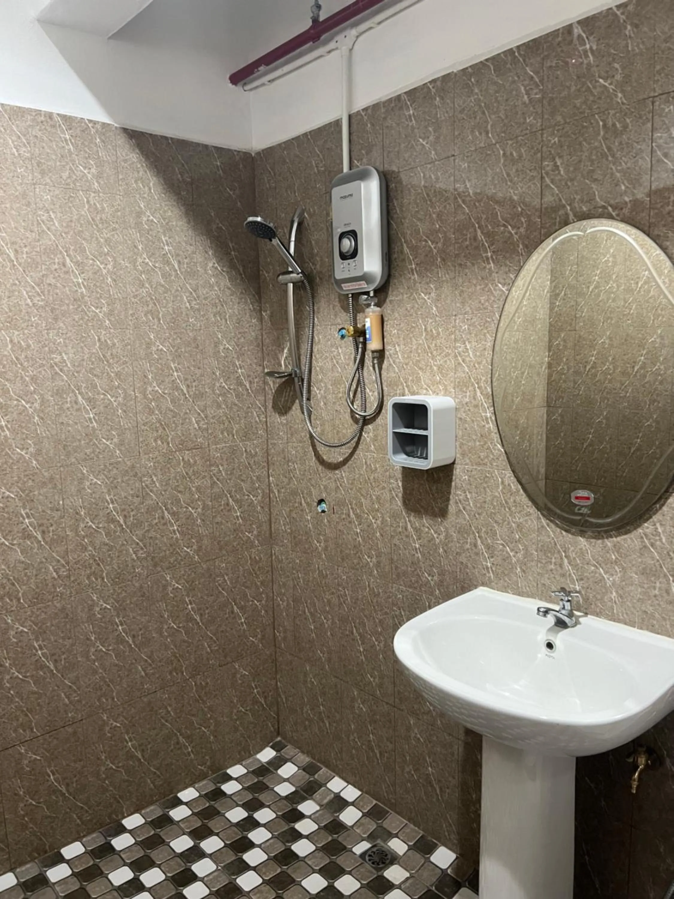 Shower in Mall Suites Hotel