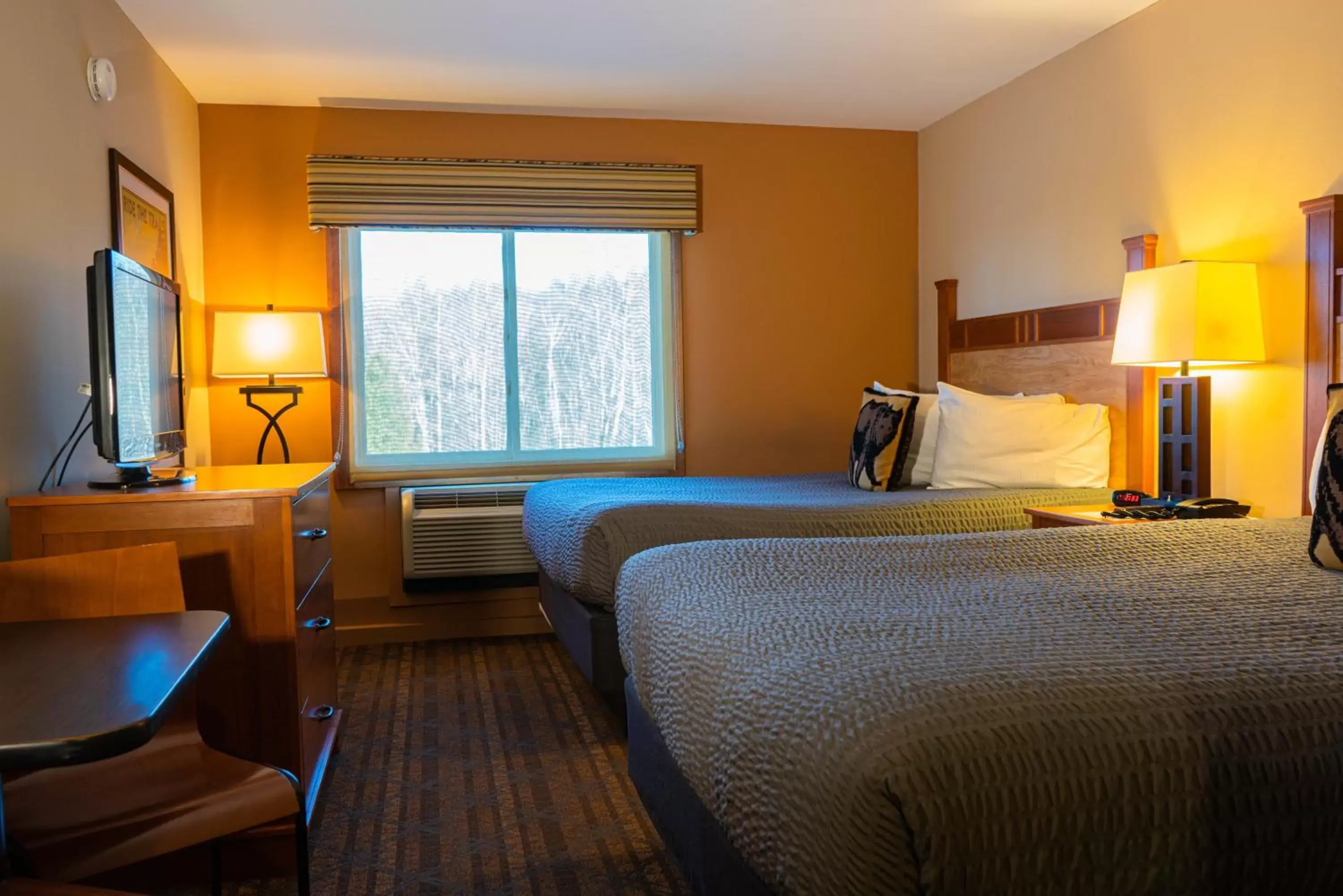 Bed in The Black Bear Lodge at Stratton Mountain Resort