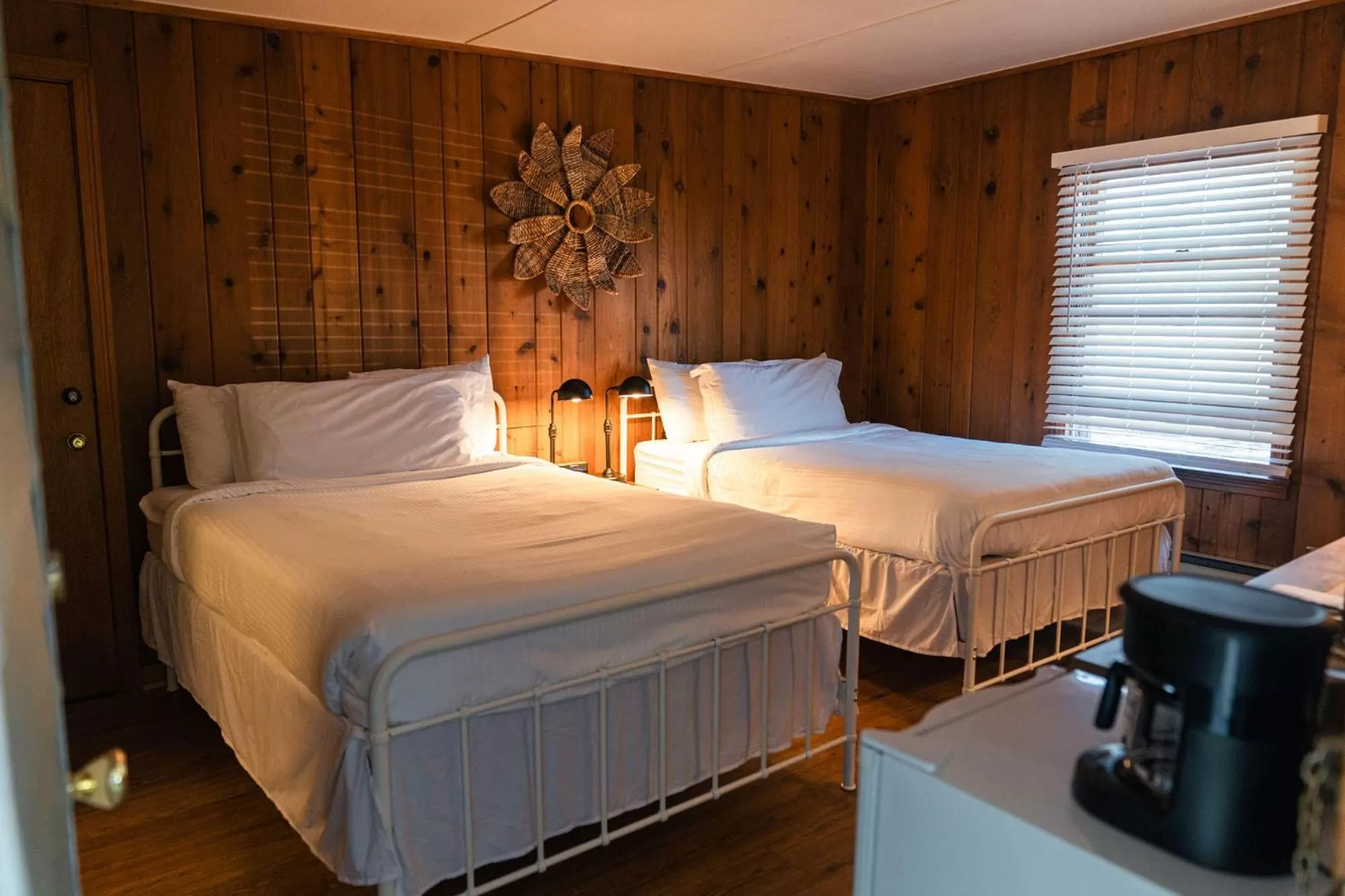 Bed in Whispering Winds Motel