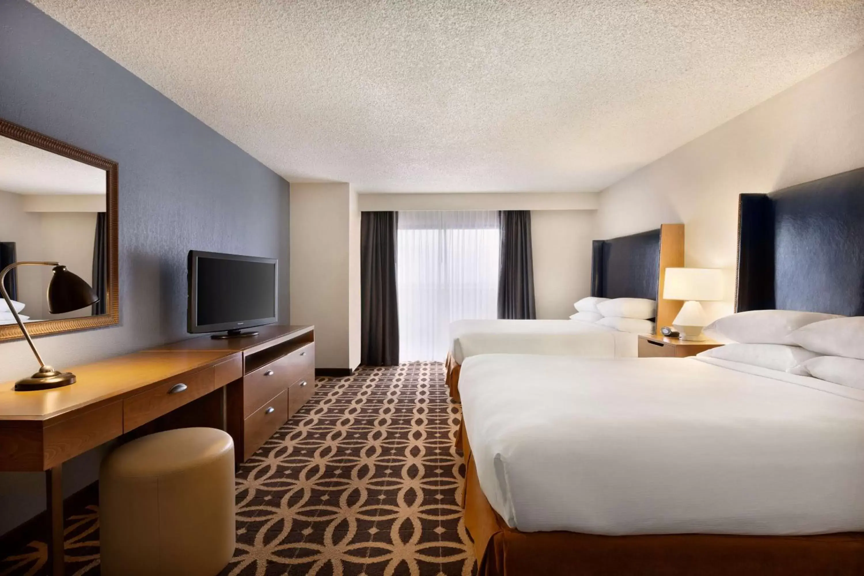 Bed, TV/Entertainment Center in Embassy Suites Dallas - DFW International Airport South