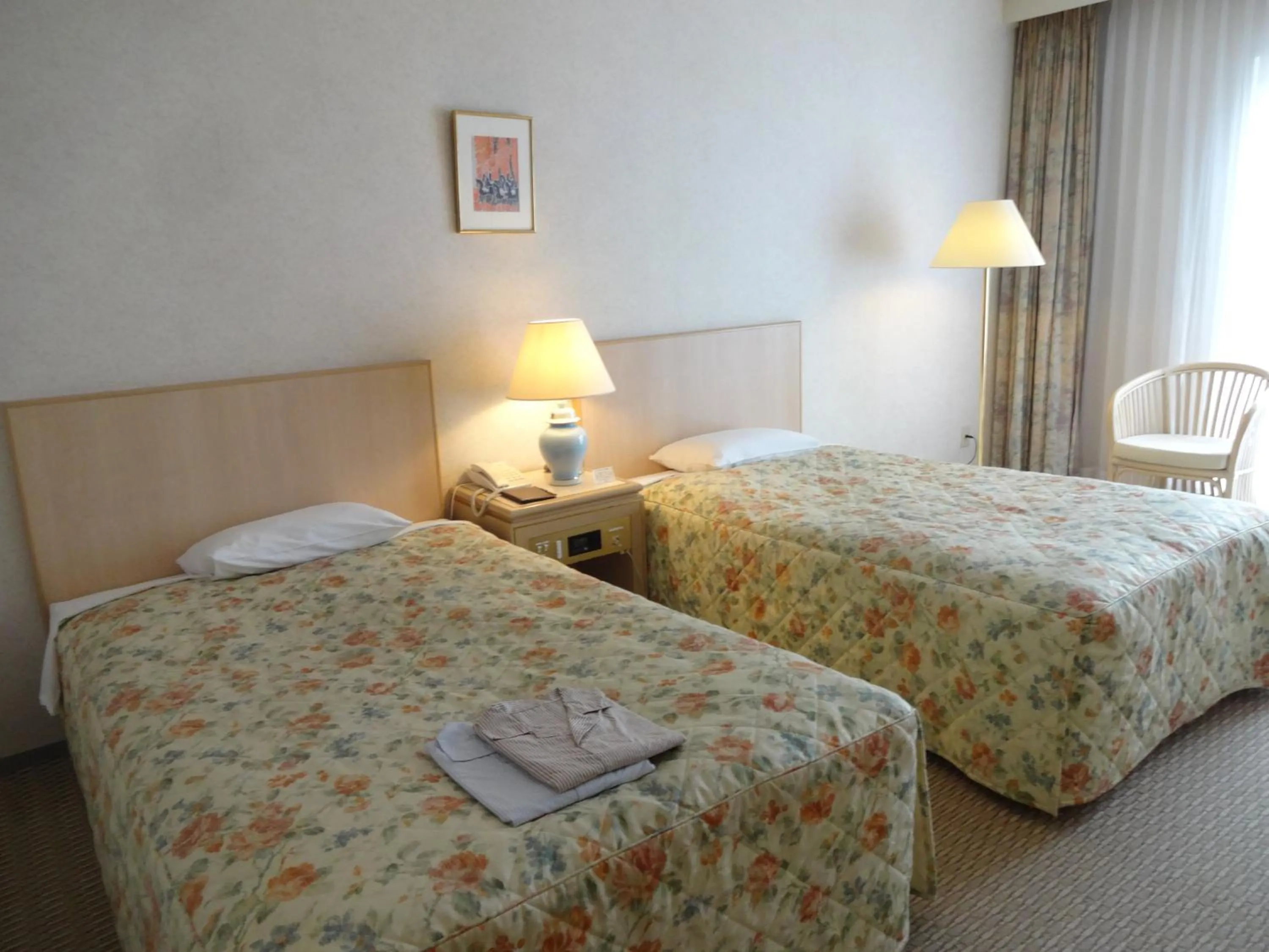 Bed in Kyu Karuizawa Hotel Otowa No Mori