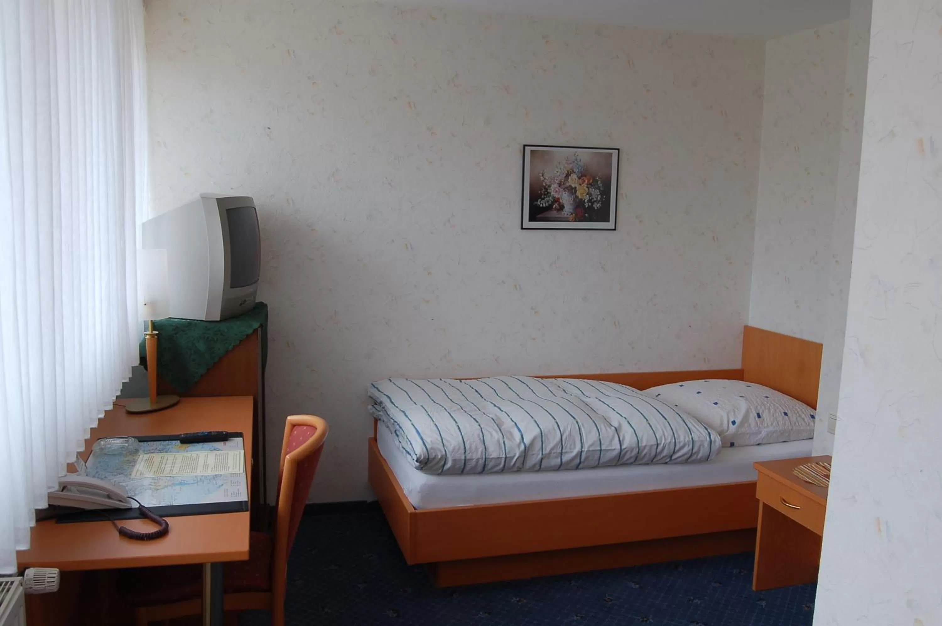 Photo of the whole room, Bed in Gasthof Waldesruh